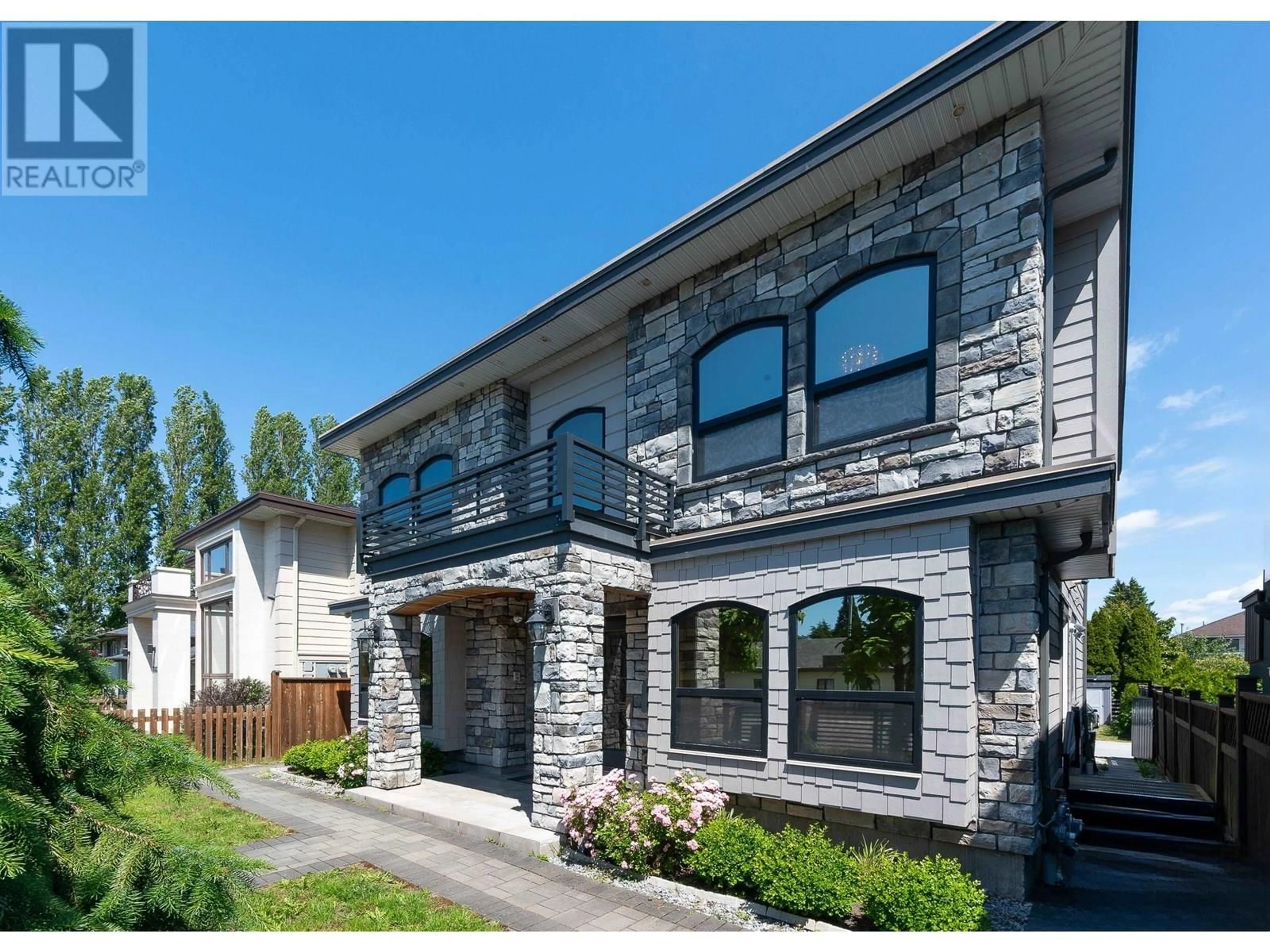 Home with brick exterior material, street for 7100 NO. 2 ROAD, Richmond British Columbia V7C3L6