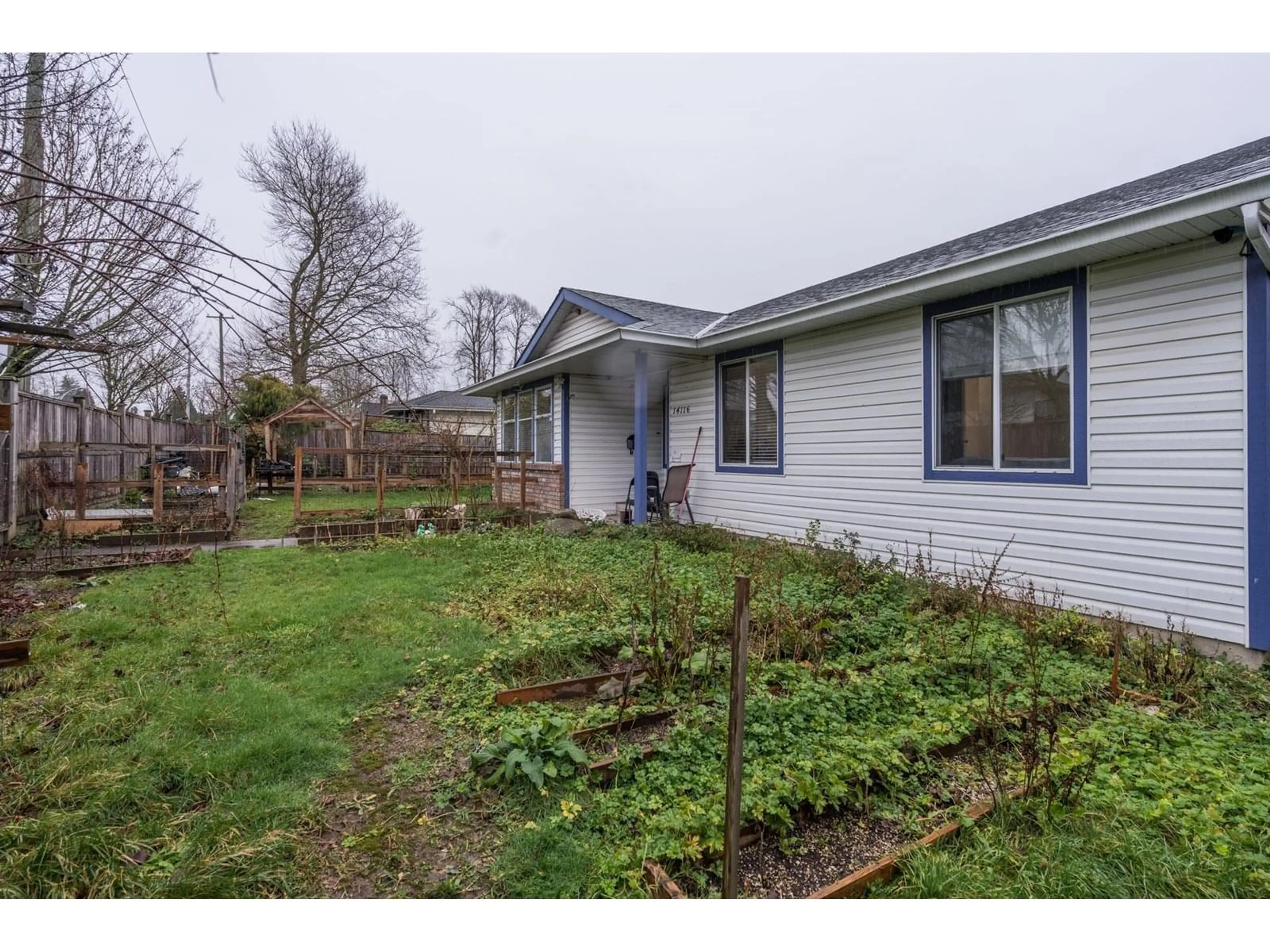 A pic from outside/outdoor area/front of a property/back of a property/a pic from drone, street for 14116 88, Surrey British Columbia V3W3L6