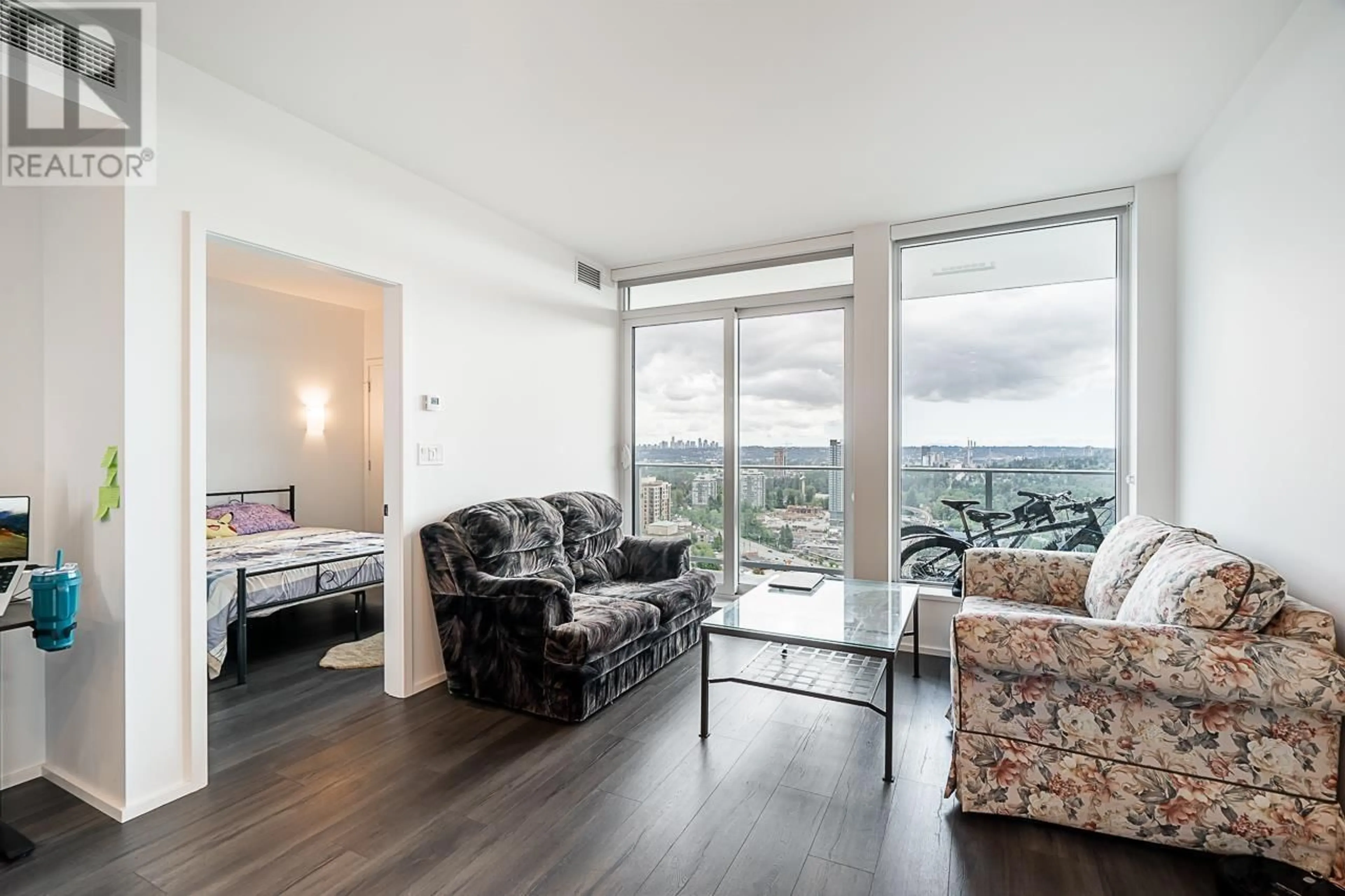 Living room with furniture, wood/laminate floor for 1907 - 3888 EVERGREEN PLACE, Burnaby British Columbia V3J0M3