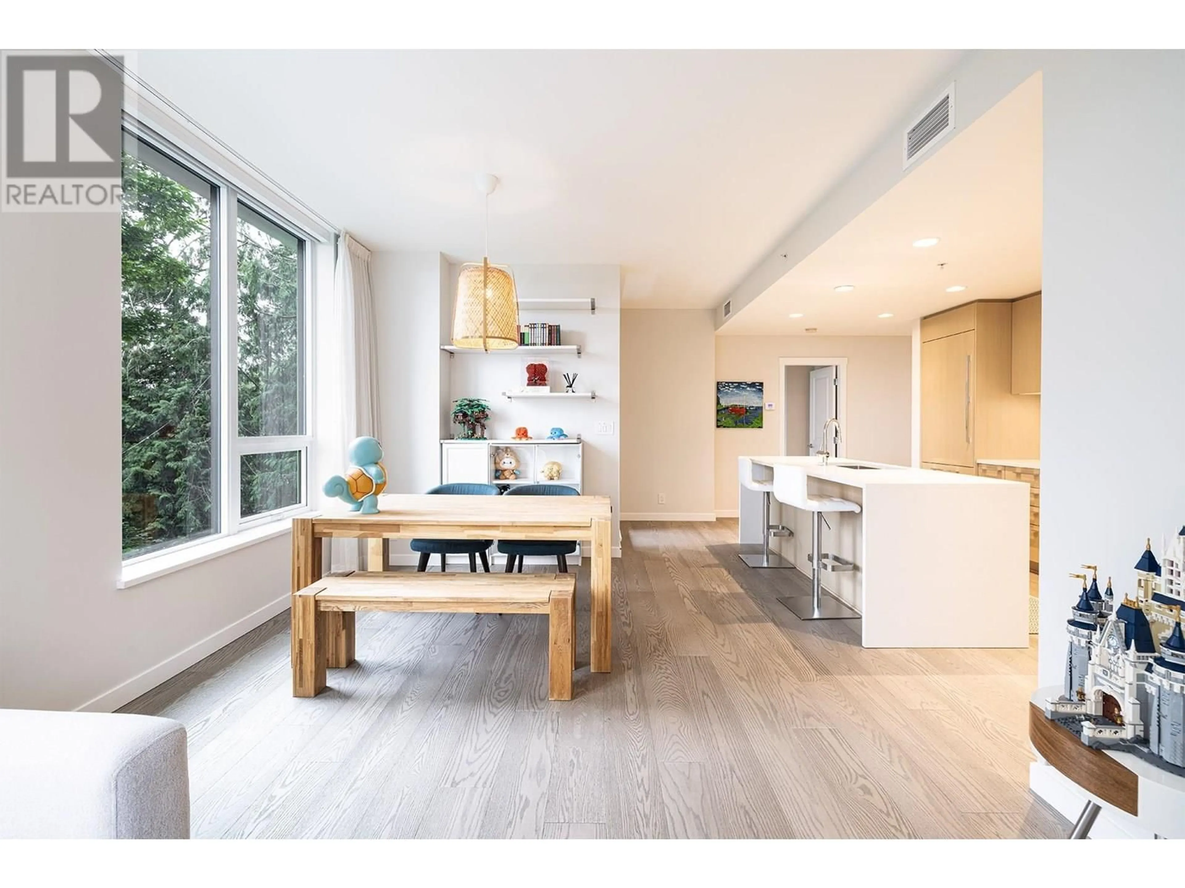Open concept kitchen, wood/laminate floor for 409 - 3533 ROSS DRIVE, Vancouver British Columbia V6S0L3