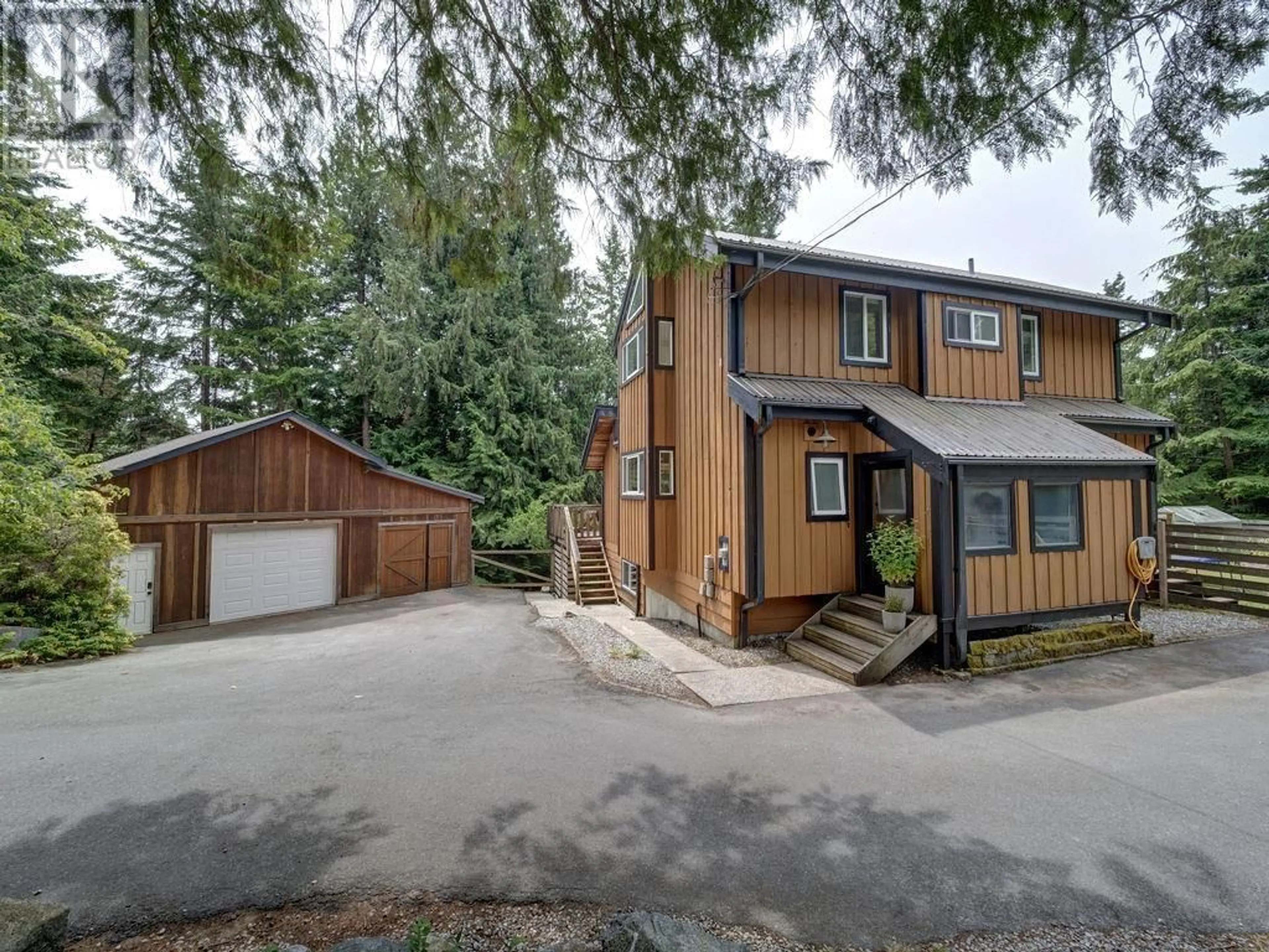 A pic from outside/outdoor area/front of a property/back of a property/a pic from drone, street for 8057 COOPER ROAD, Halfmoon Bay British Columbia V7Z1A6