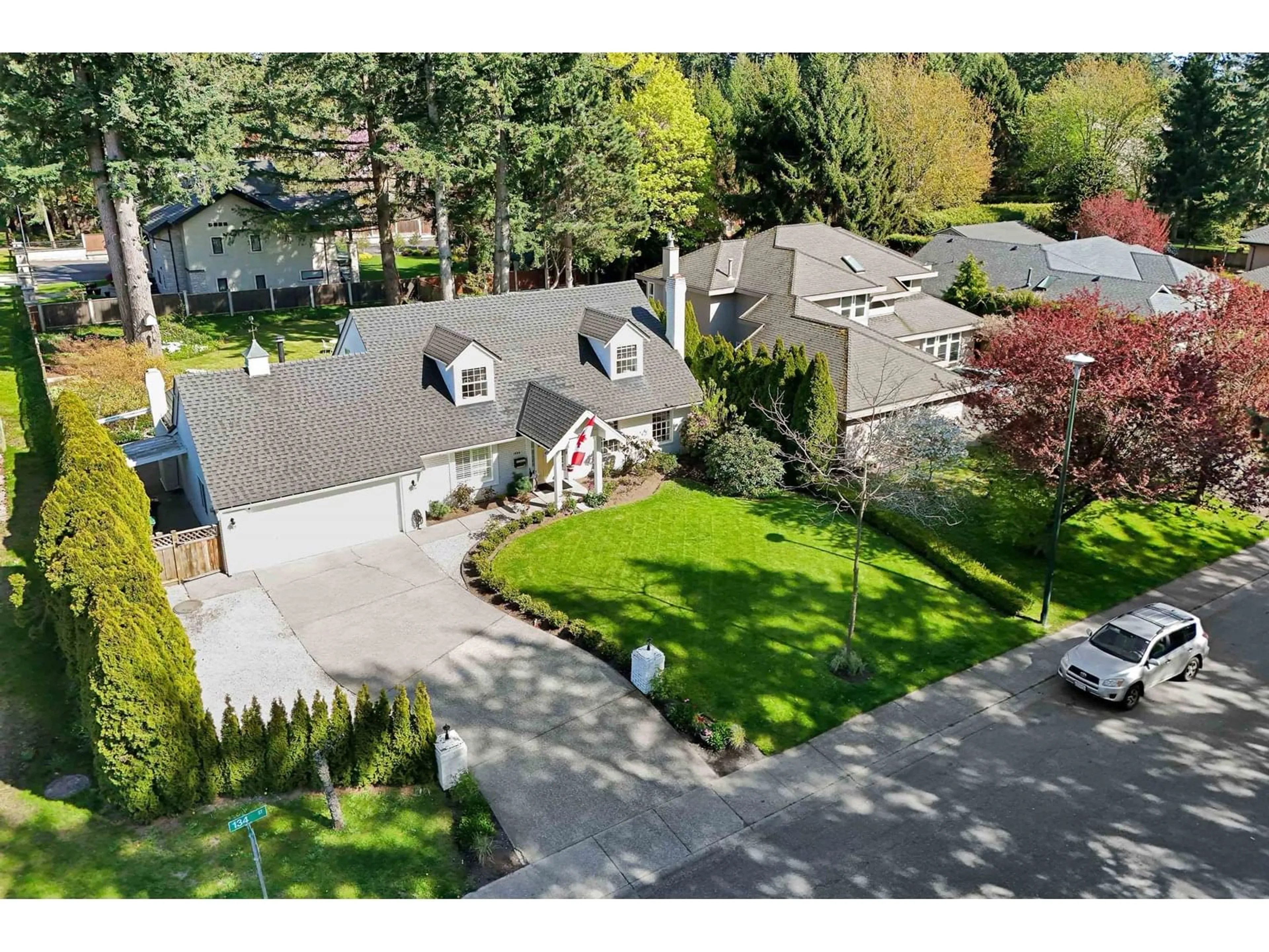 A pic from outside/outdoor area/front of a property/back of a property/a pic from drone, street for 1990 134, Surrey British Columbia V3S0W2