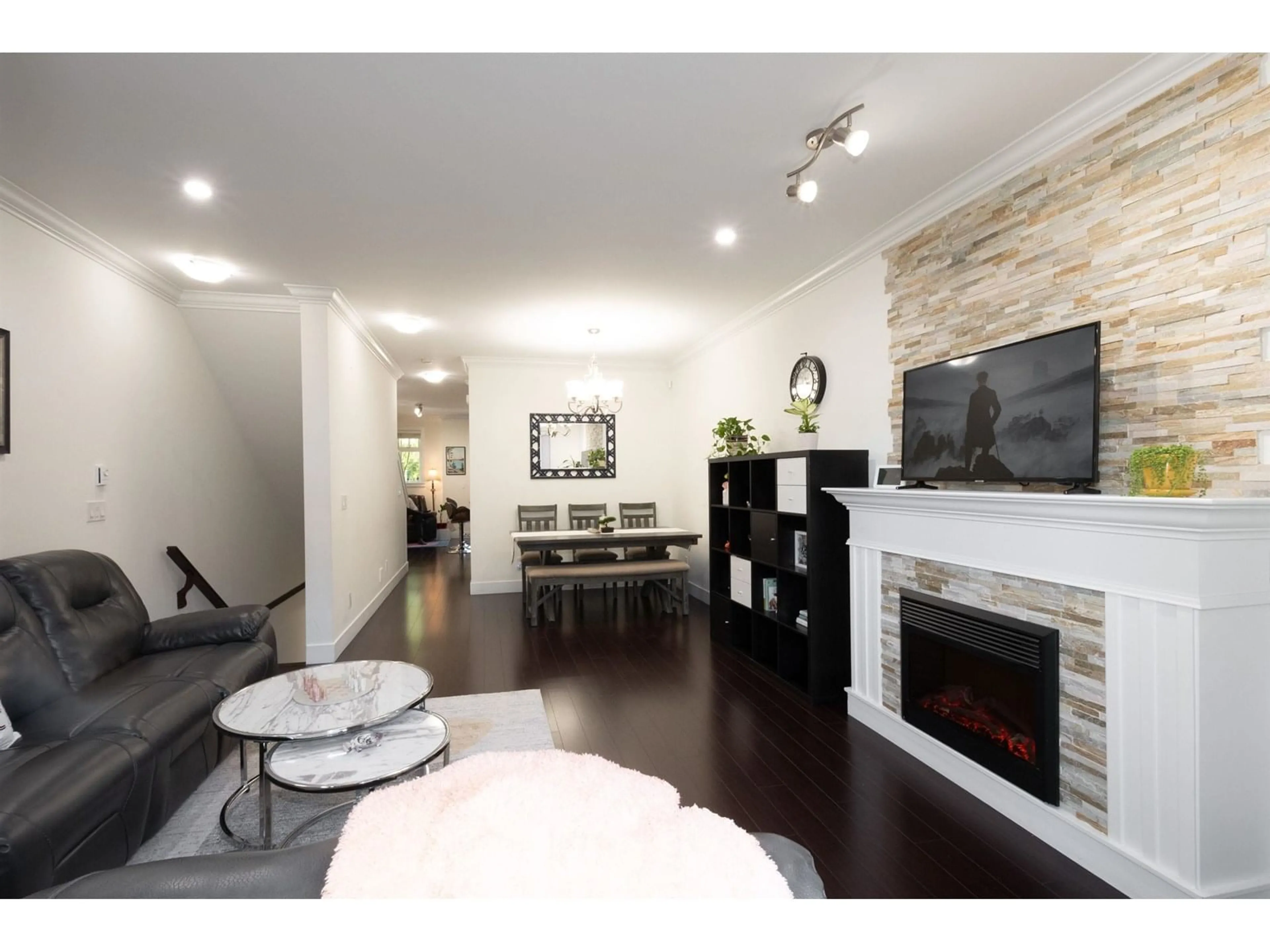 Living room with furniture, wood/laminate floor for 8 - 6383 140, Surrey British Columbia V3W0E9