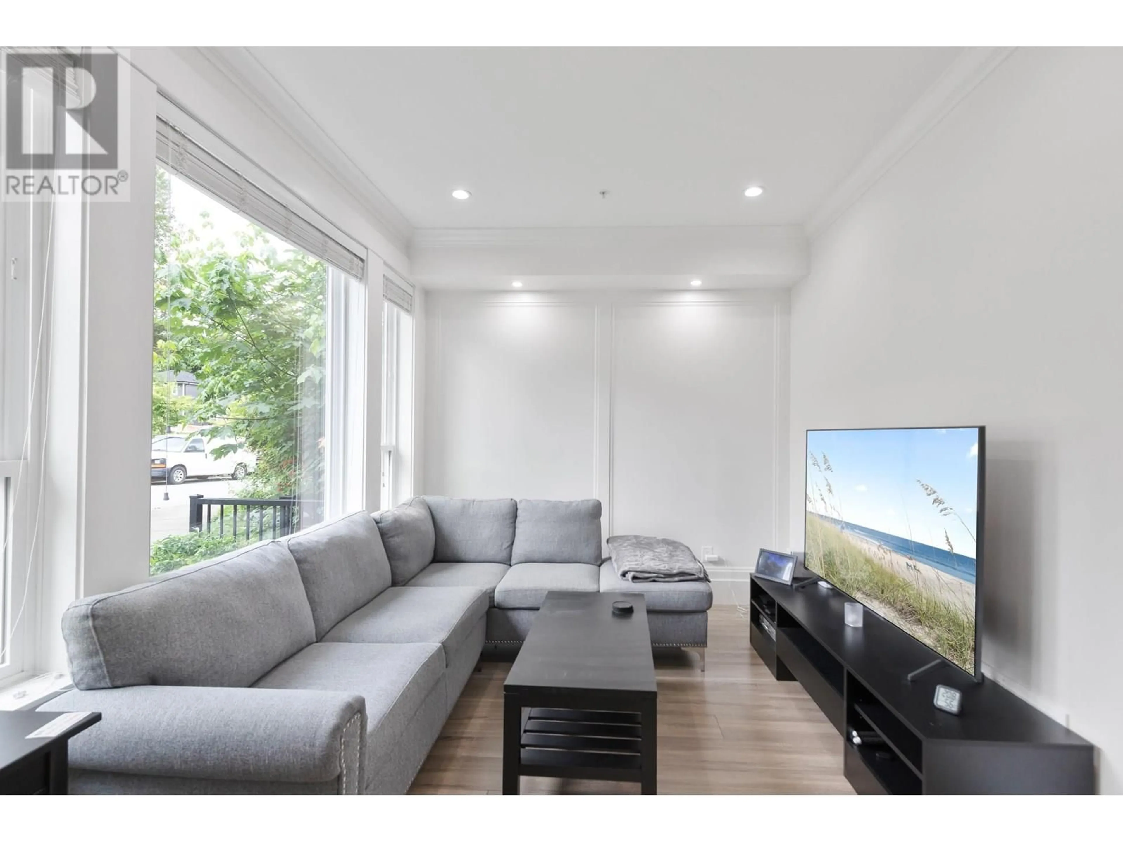 Living room with furniture, wood/laminate floor for 13667 232A STREET, Maple Ridge British Columbia V4R0H1
