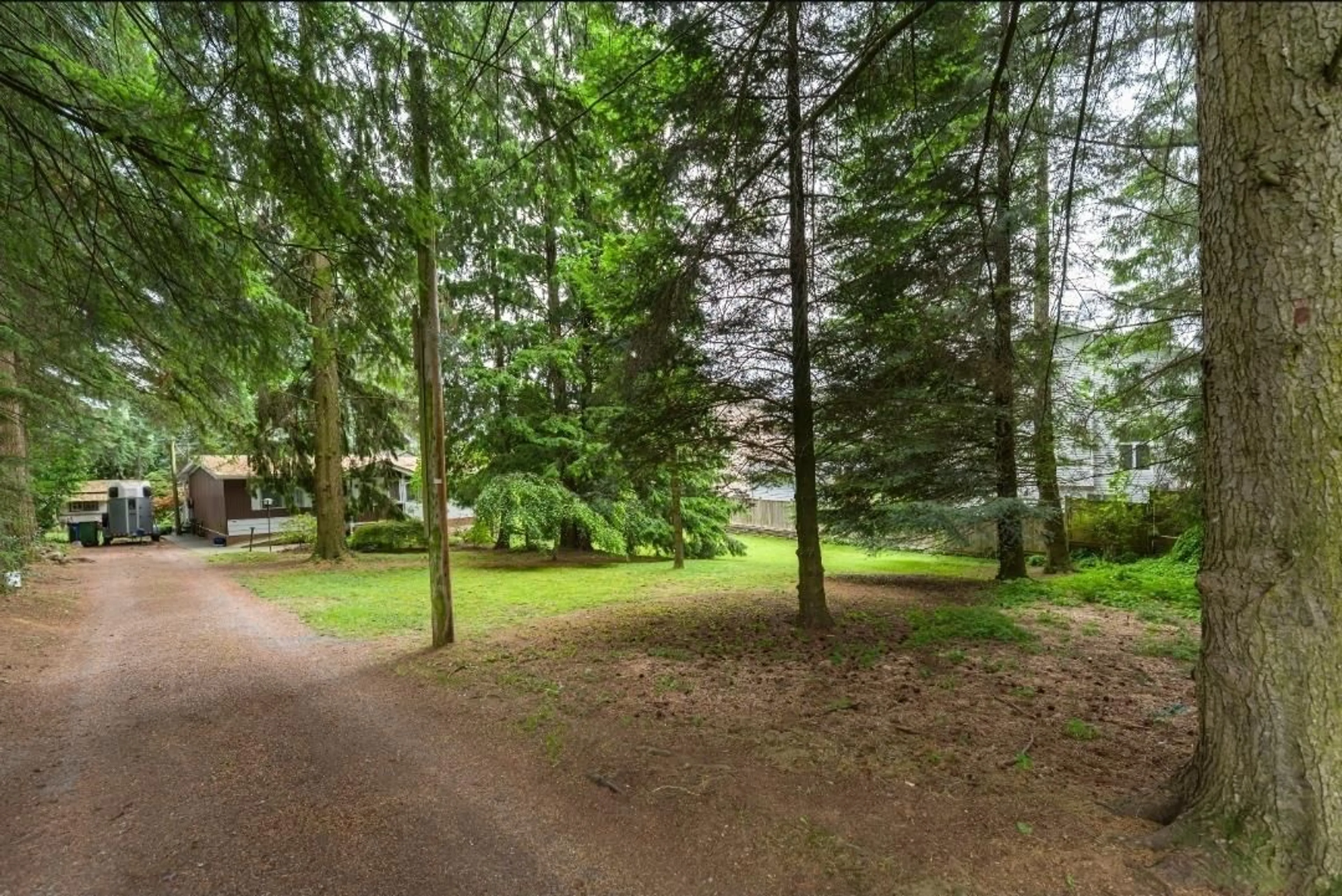 A pic from outside/outdoor area/front of a property/back of a property/a pic from drone, forest/trees view for 2161 MARTENS, Abbotsford British Columbia V2T6M6