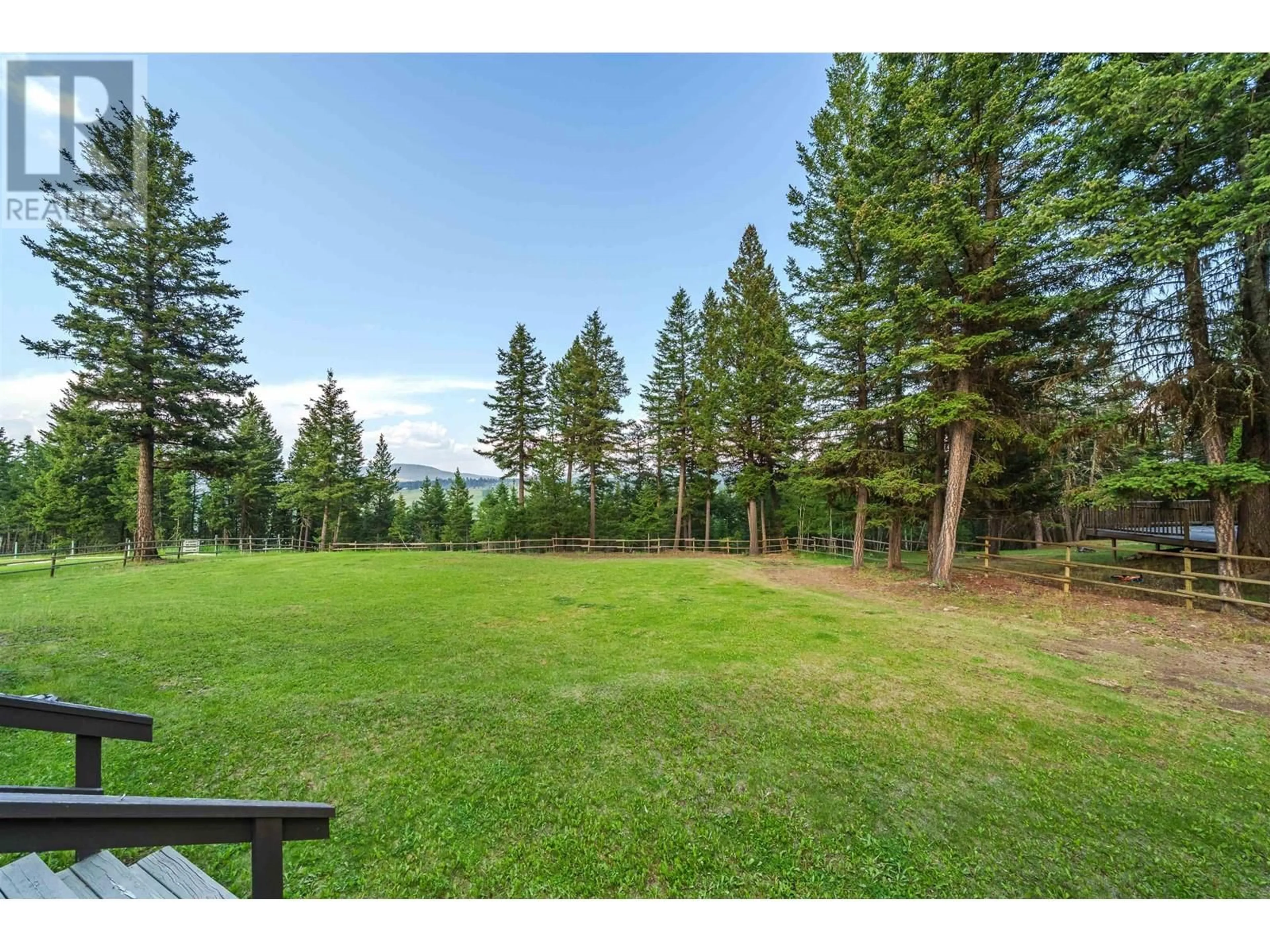 A pic from outside/outdoor area/front of a property/back of a property/a pic from drone, forest/trees view for 4943 KYLLO ROAD, 108 Mile Ranch British Columbia V0K2Z0