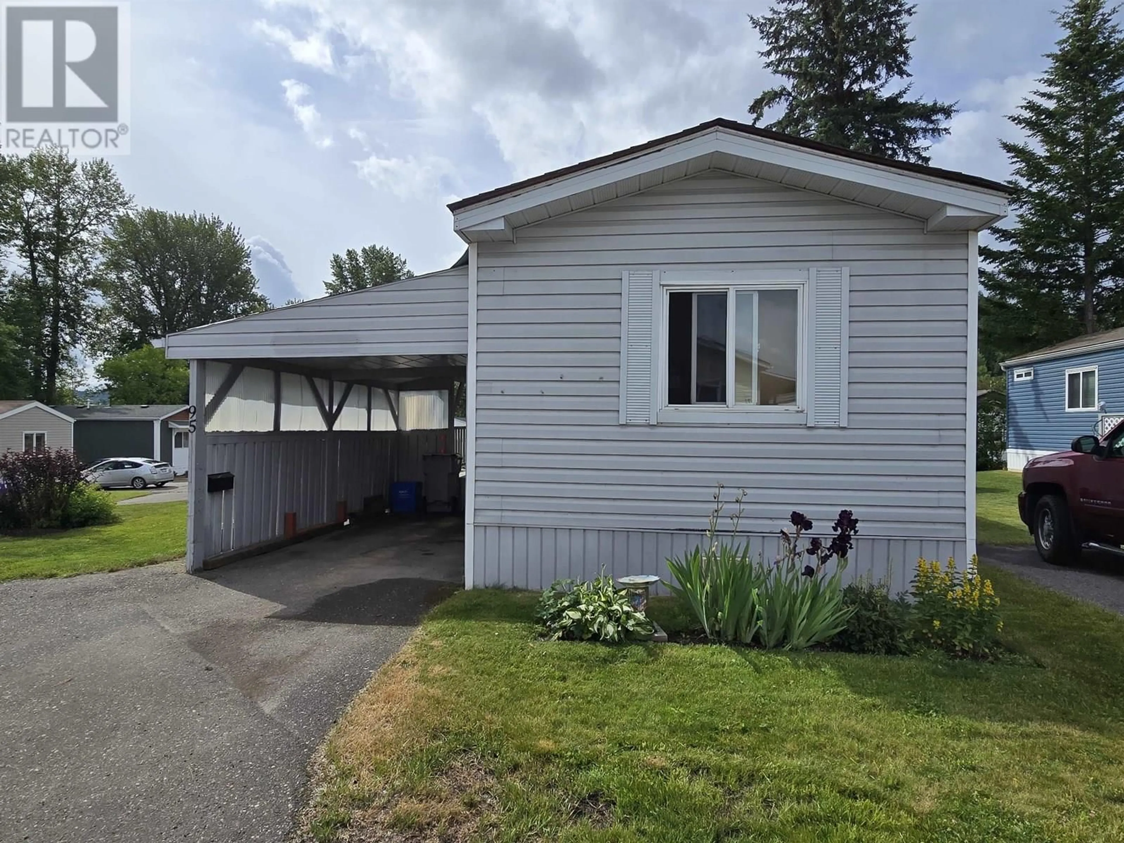 Home with vinyl exterior material, street for 95 - 684 NORTH FRASER DRIVE, Quesnel British Columbia V2J1Z6