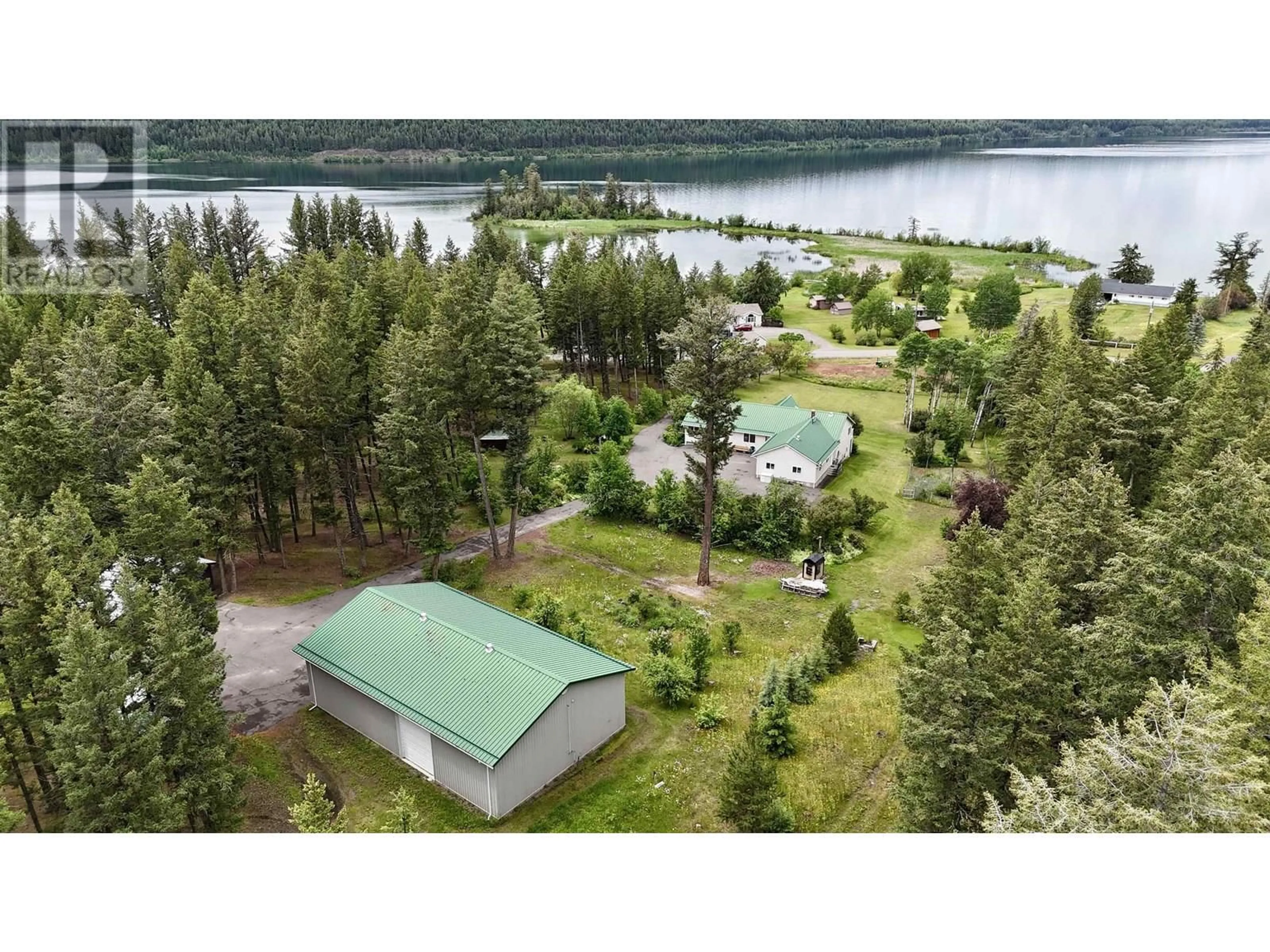 A pic from outside/outdoor area/front of a property/back of a property/a pic from drone, water/lake/river/ocean view for 3683 FORBES ROAD, Lac La Hache British Columbia V0K1T0