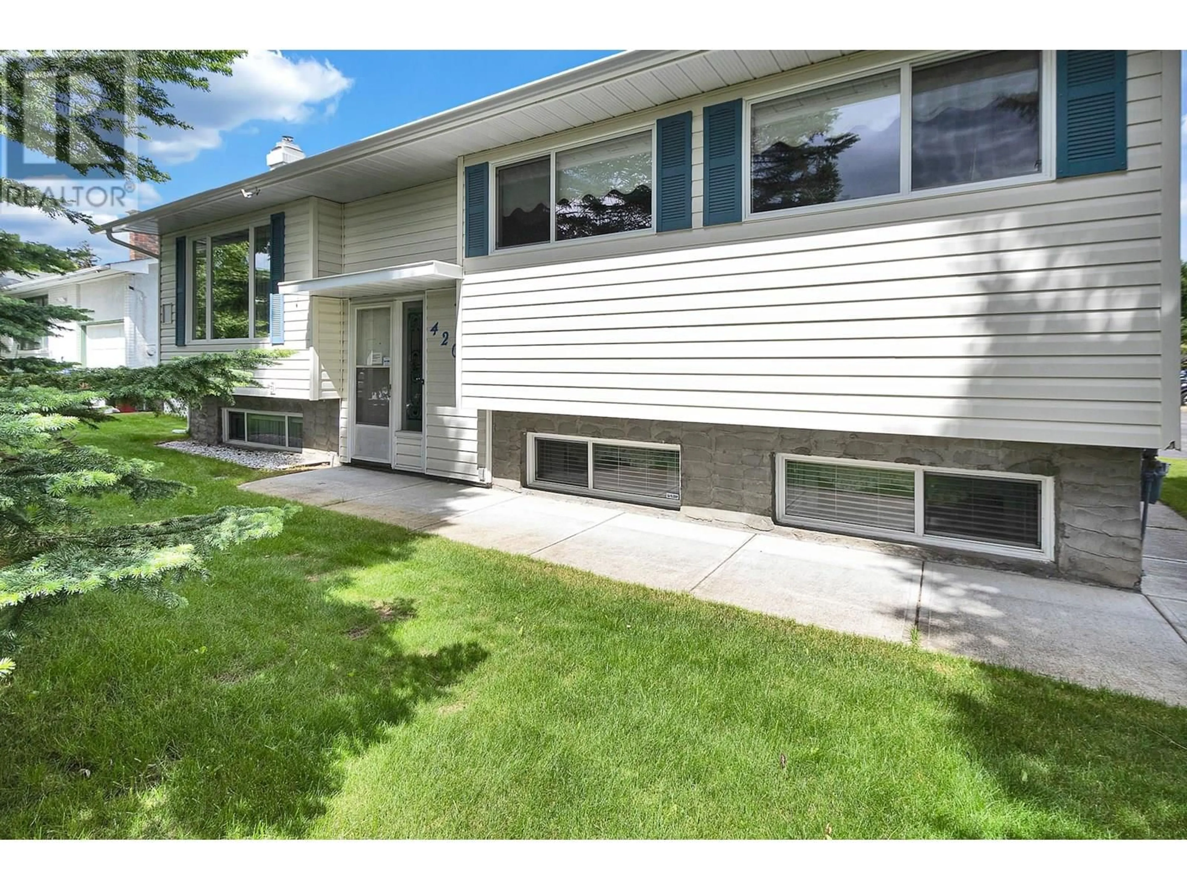 Home with vinyl exterior material, street for 4202 PUNCHAW CRESCENT, Prince George British Columbia V2M5E9
