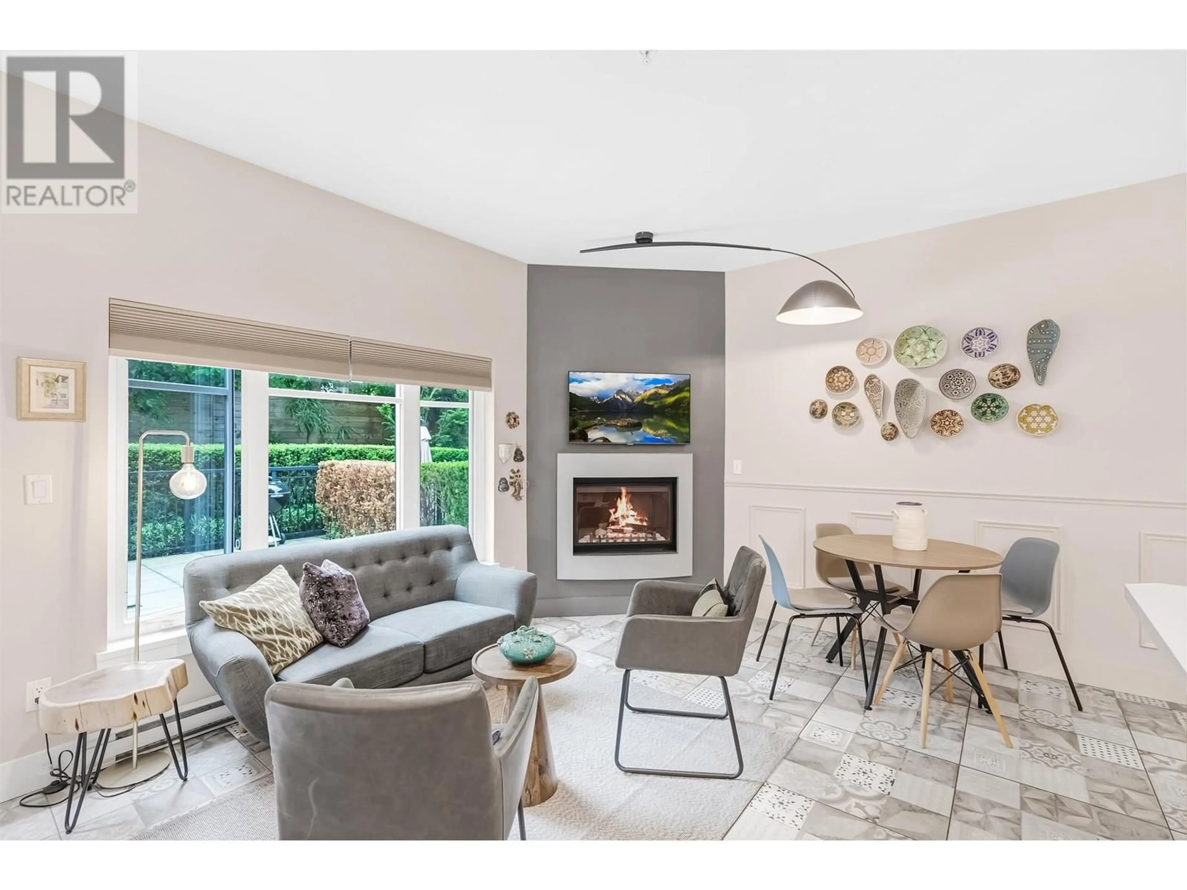 Living room with furniture, ceramic/tile floor for 460 5TH AVENUE, Vancouver British Columbia V5T1H9