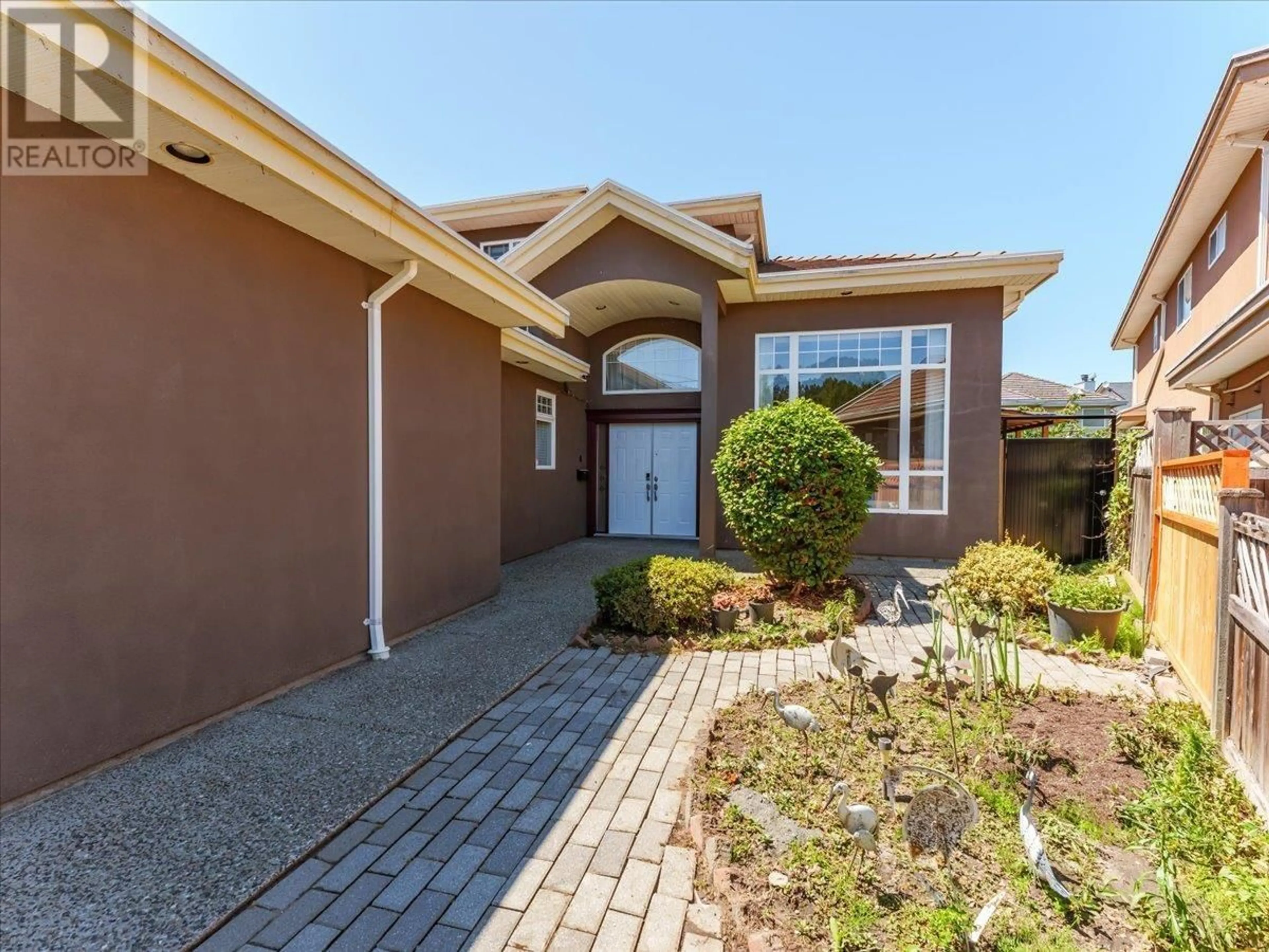 Home with brick exterior material, street for 10099 RUSKIN ROAD, Richmond British Columbia V7A2P3