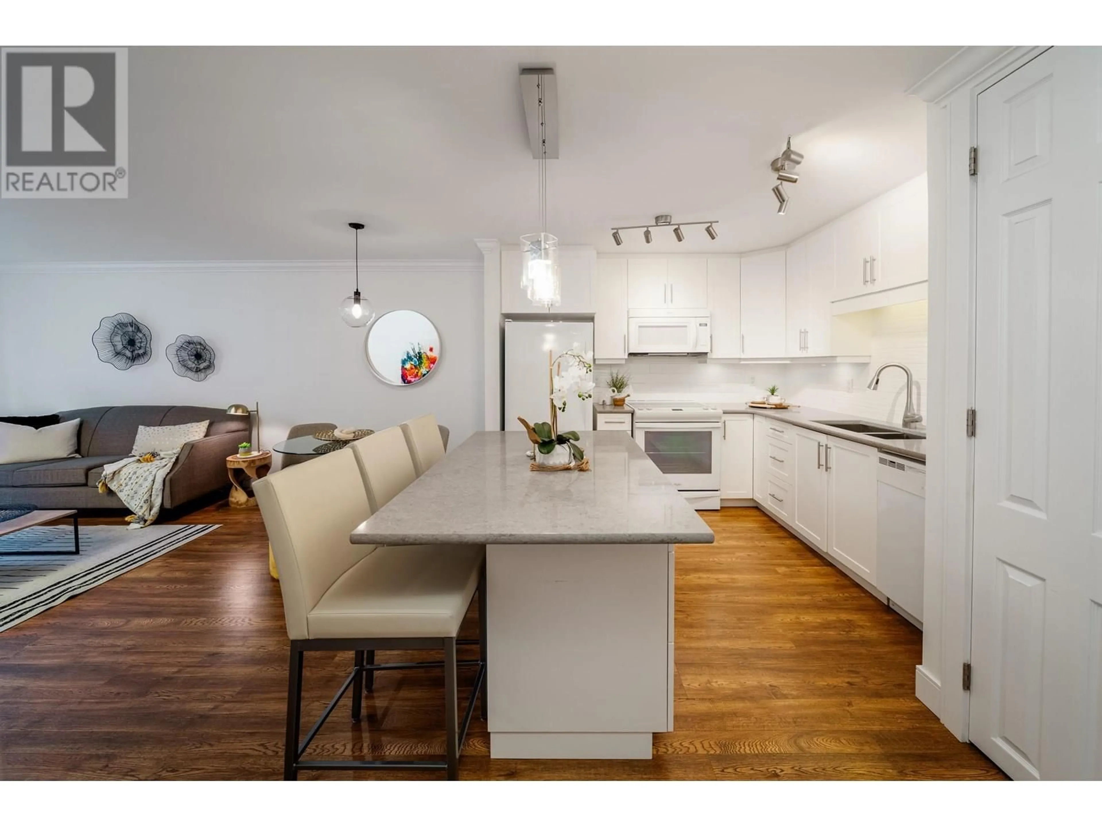 Open concept kitchen, wood/laminate floor for 106 - 1750 AUGUSTA AVENUE, Burnaby British Columbia V5A2V6