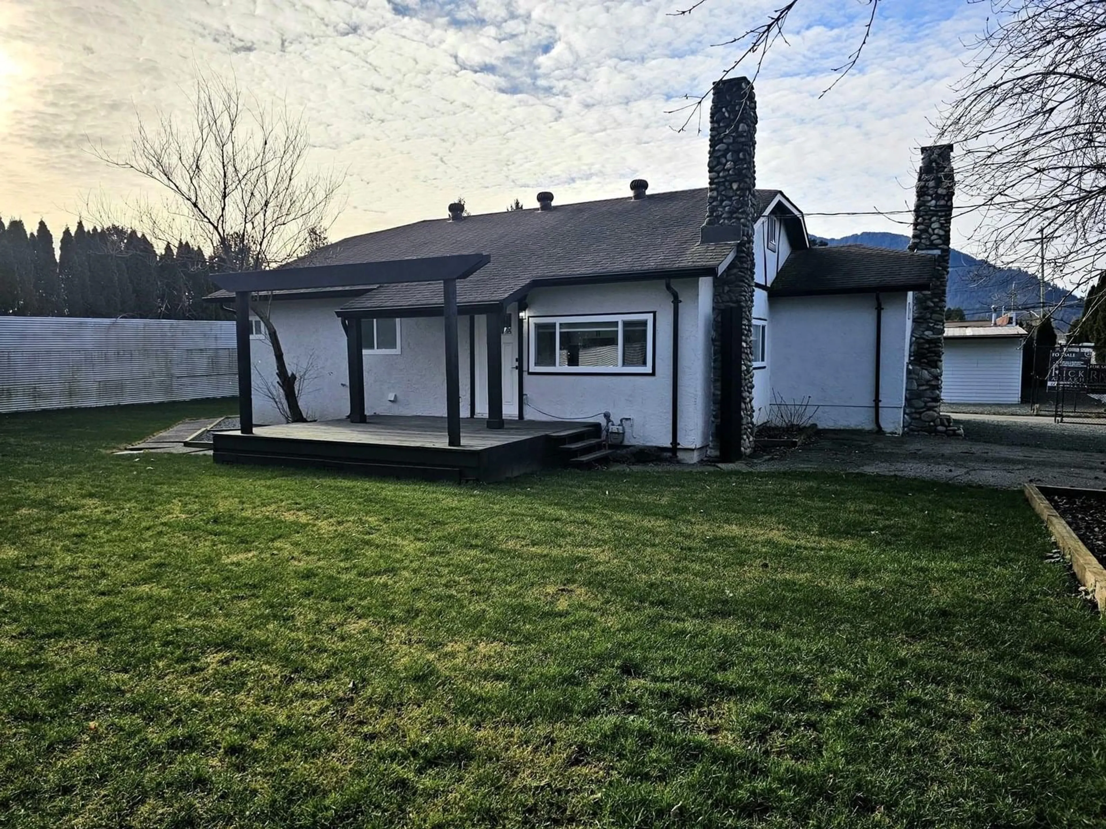 A pic from outside/outdoor area/front of a property/back of a property/a pic from drone, street for 7088 SUMAS PRAIRIE ROAD, Chilliwack British Columbia V2R4K1