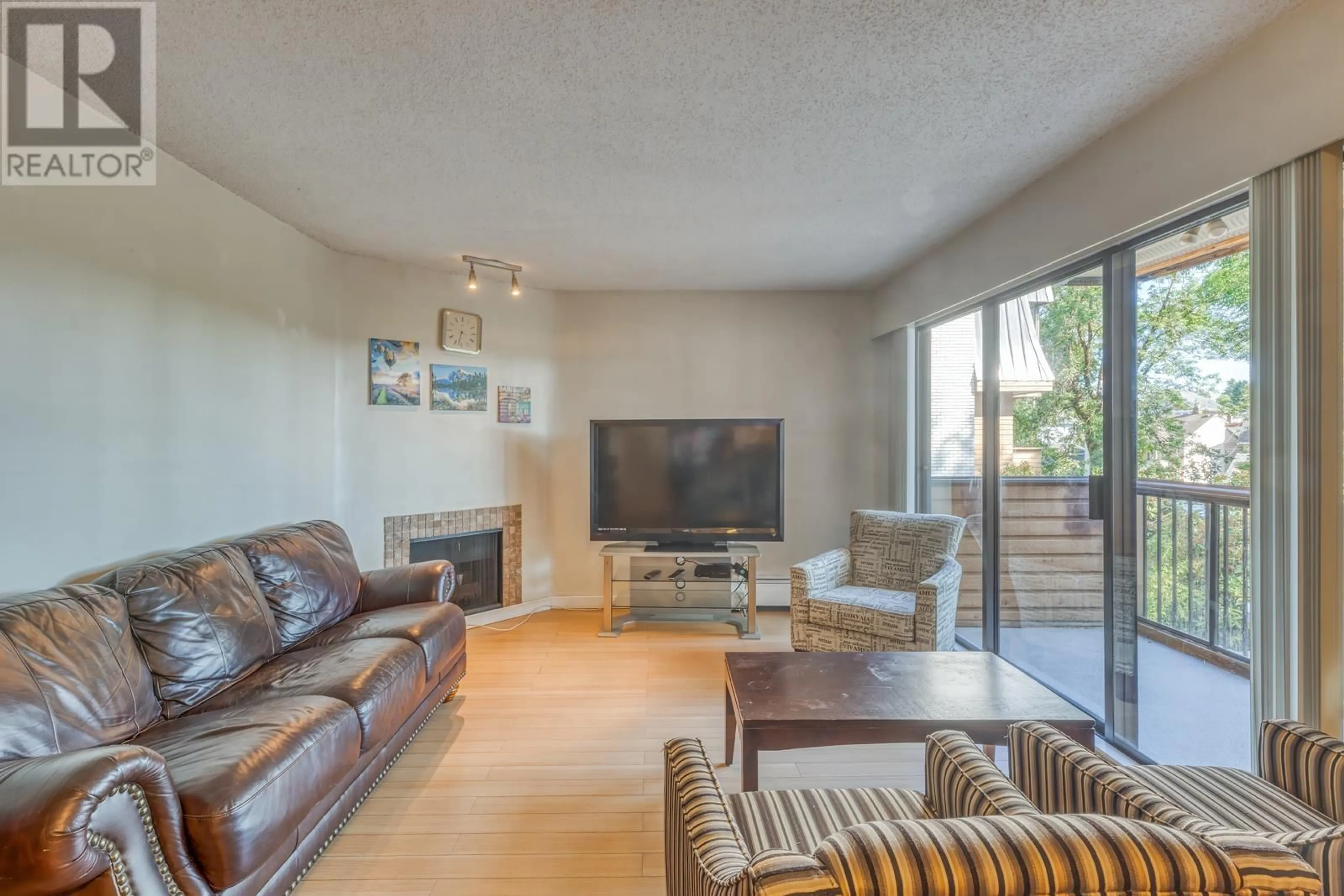 Living room with furniture, unknown for 212 - 2277 30TH AVENUE, Vancouver British Columbia V5N5N1
