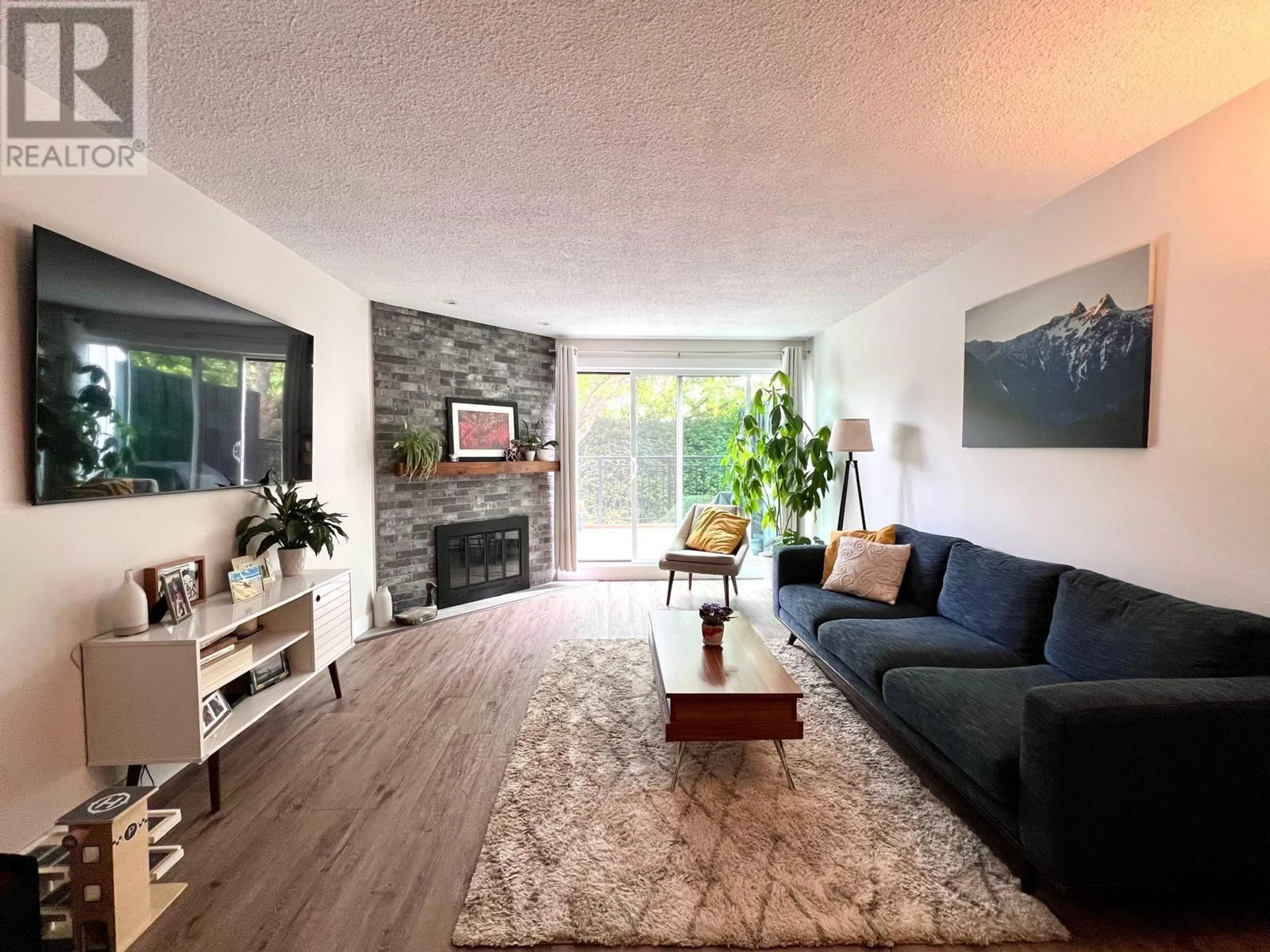 Living room with furniture, unknown for 108 - 7891 NO. 1 ROAD, Richmond British Columbia V7C1T7