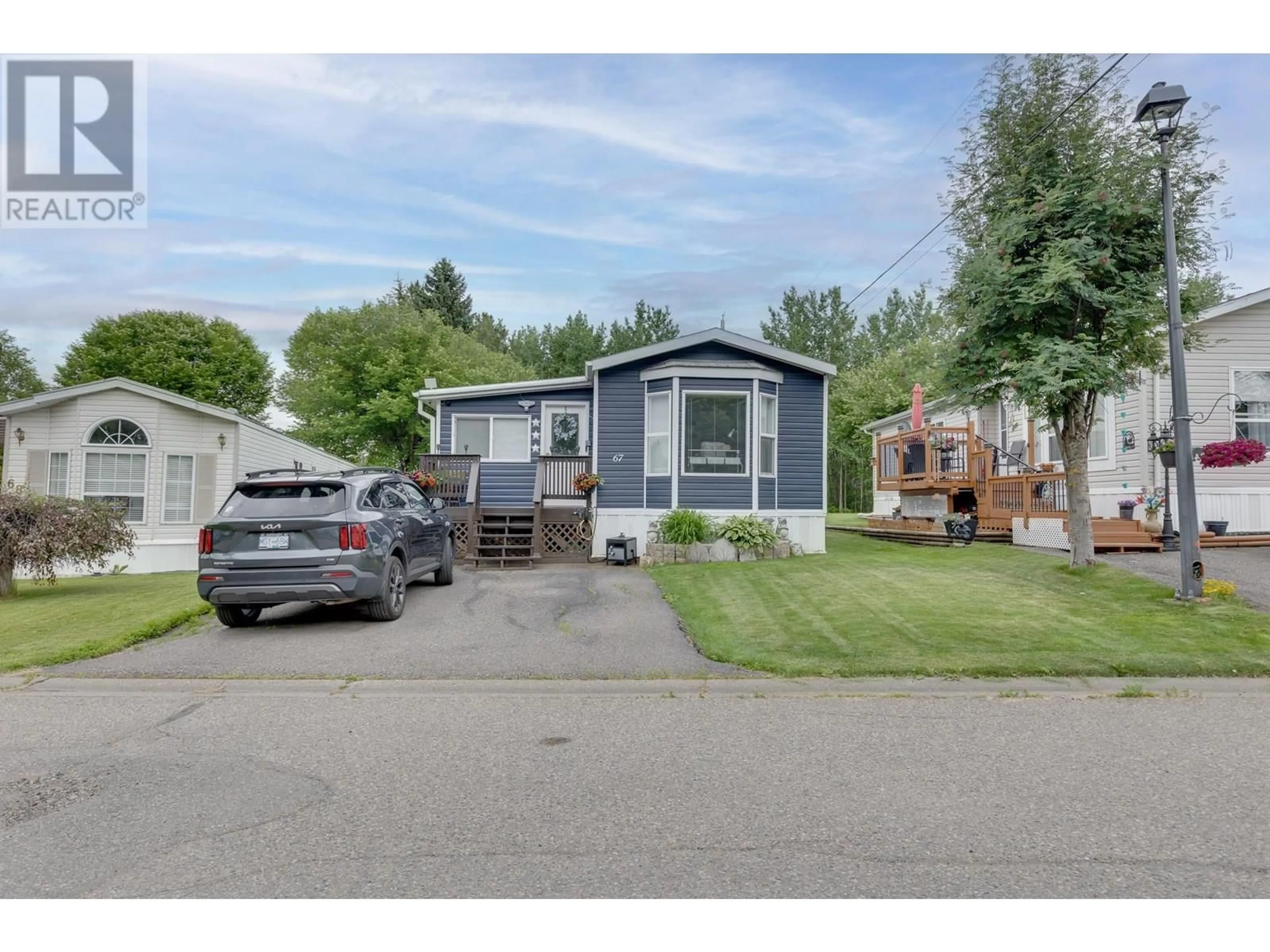 Home with vinyl exterior material, street for 67 - 1000 INVERNESS ROAD, Prince George British Columbia V2K4V1