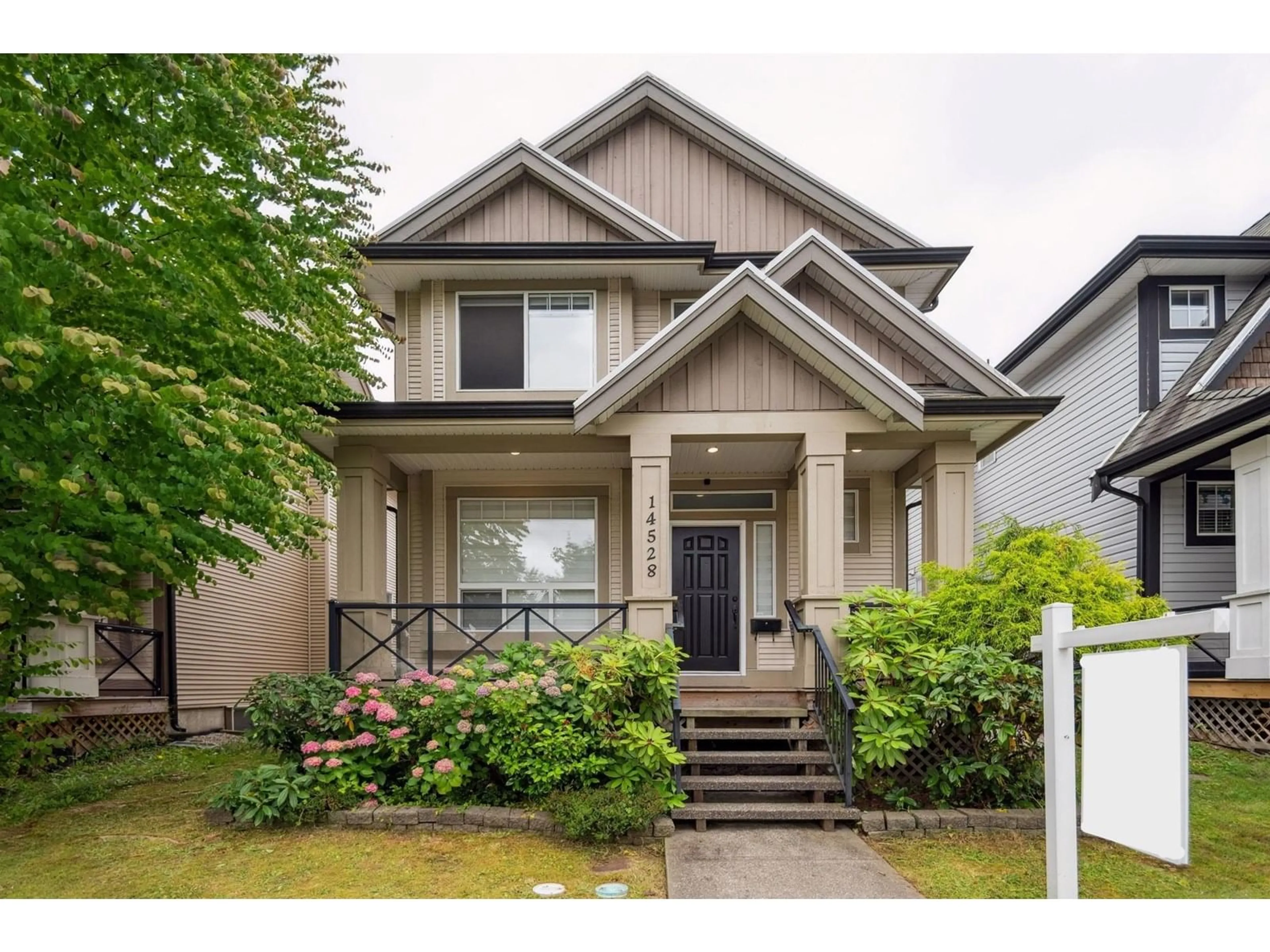 Home with vinyl exterior material, street for 14528 60, Surrey British Columbia V3S1R3