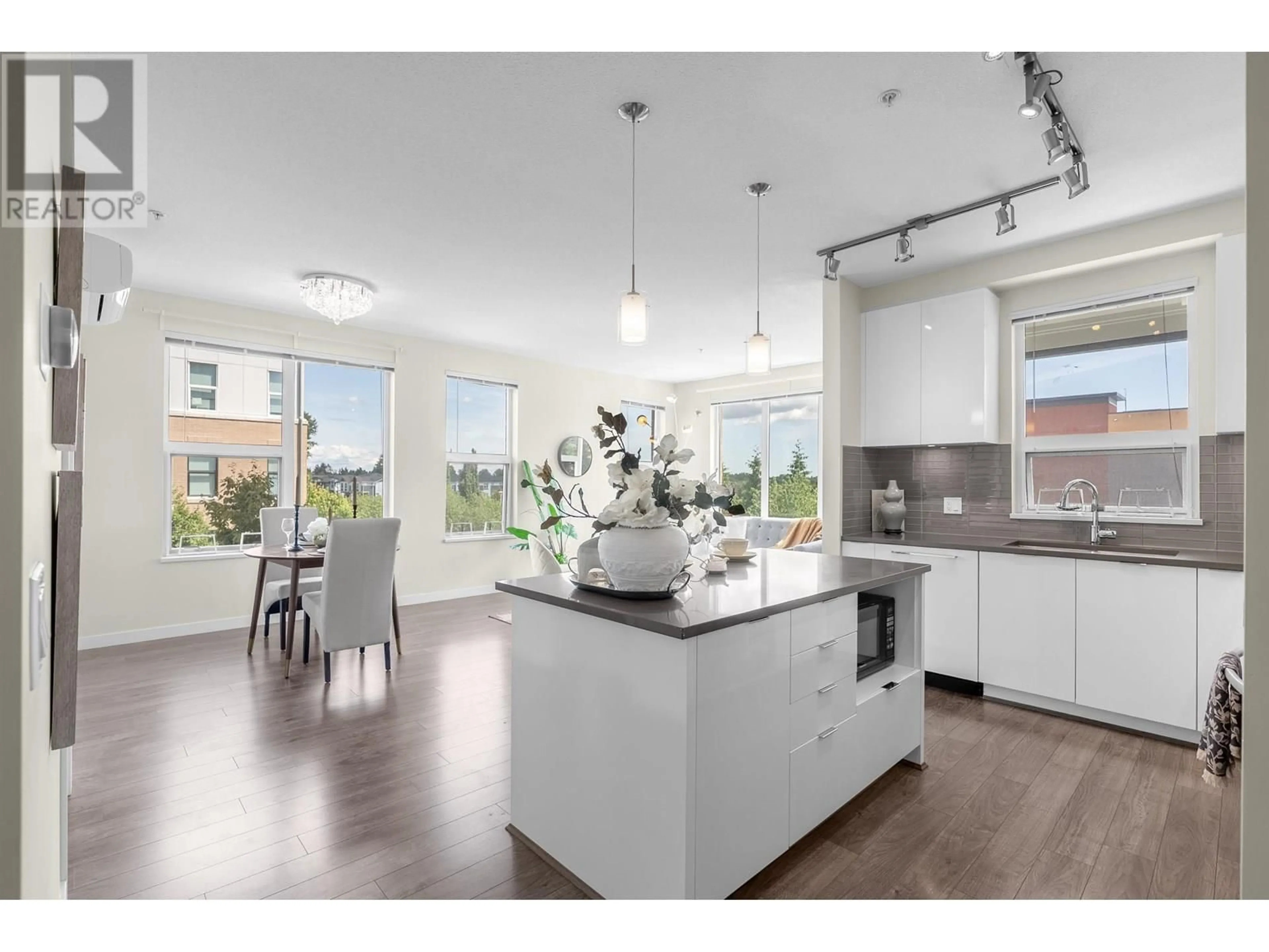 Open concept kitchen, unknown for 303 - 9311 ALEXANDRA ROAD, Richmond British Columbia V6X0L8