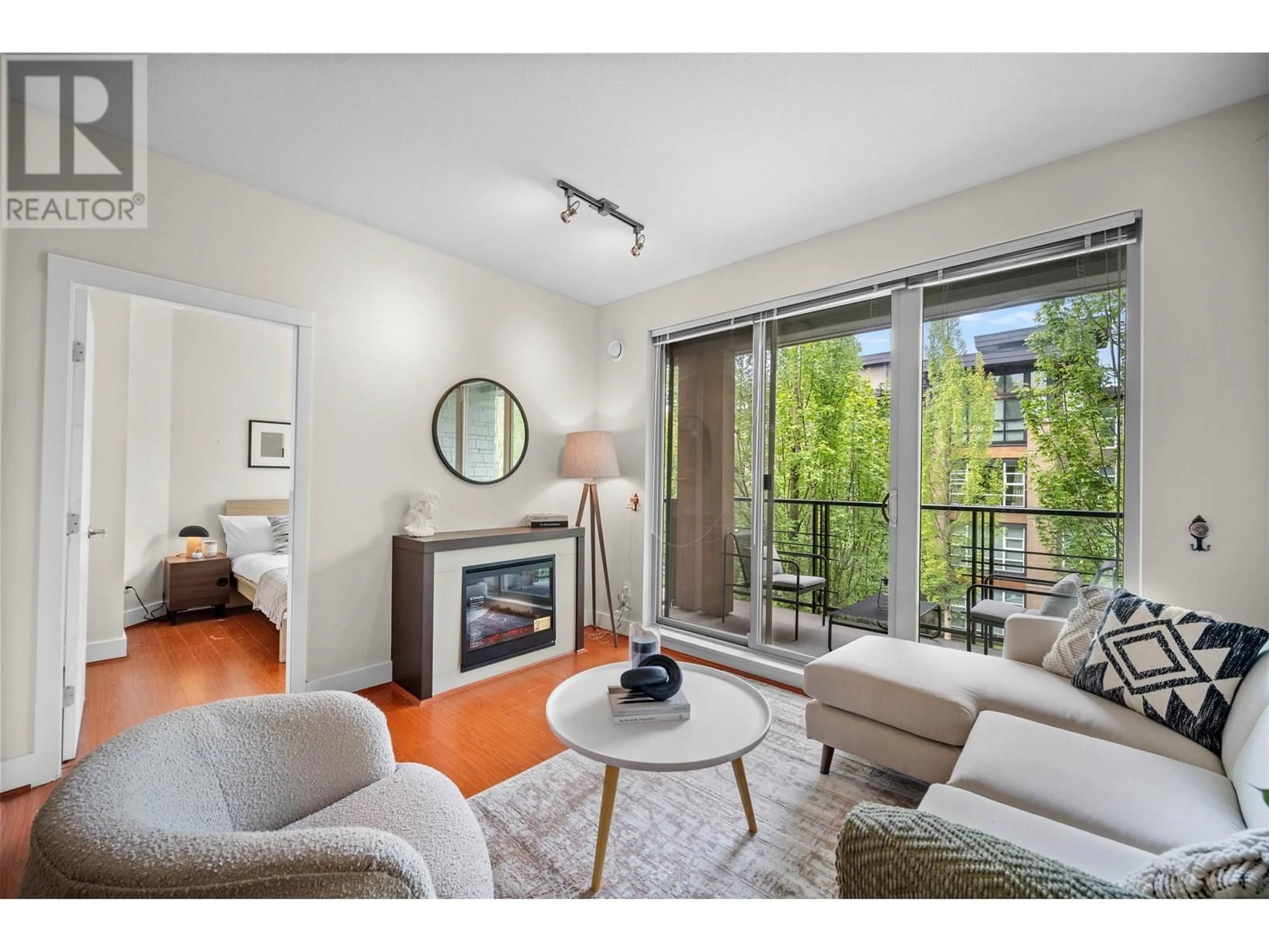 Living room with furniture, unknown for 308 - 3478 WESBROOK MALL, Vancouver British Columbia V6S0B6