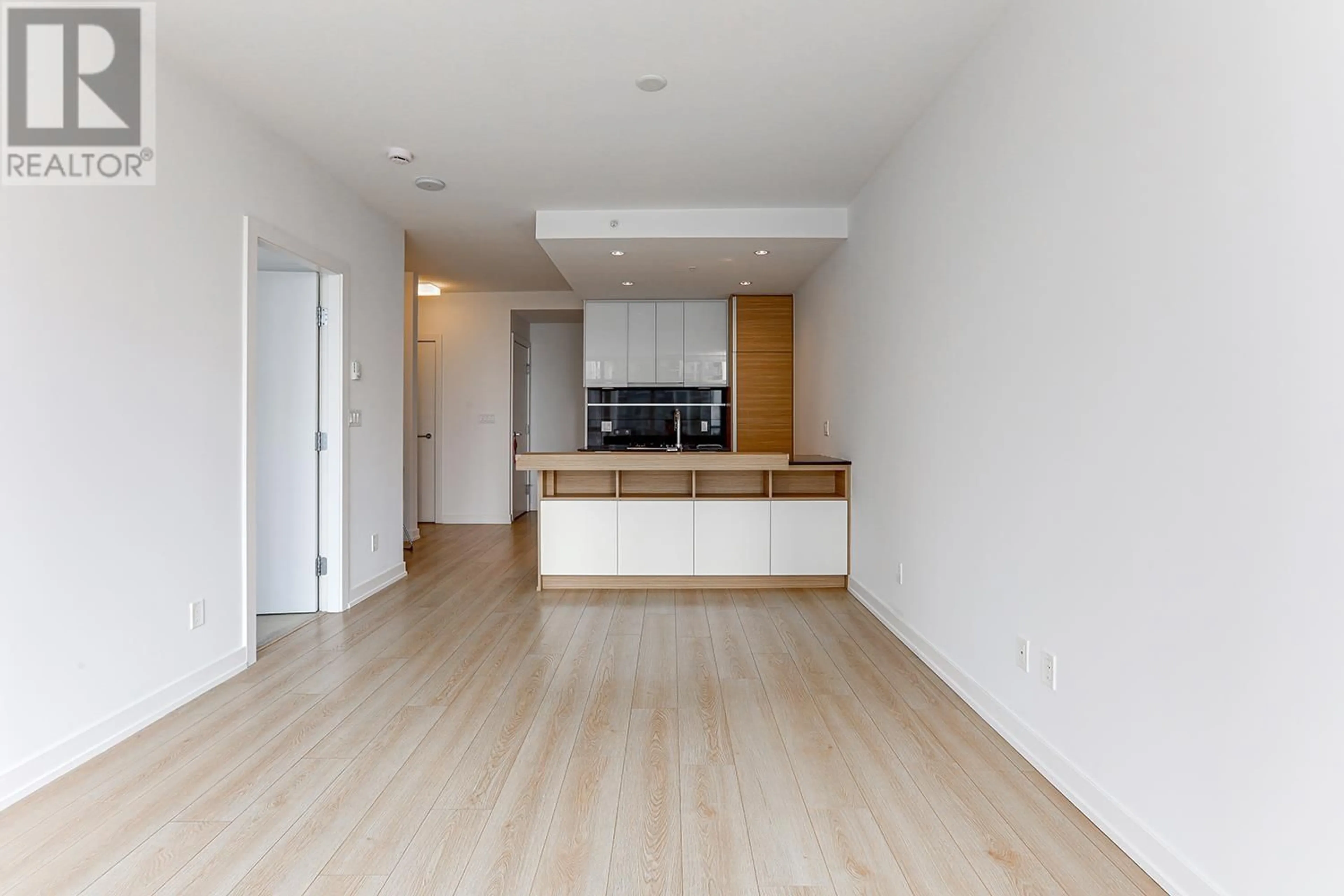 Open concept kitchen, wood/laminate floor for 1710 - 4688 KINGSWAY, Burnaby British Columbia V5H0E9
