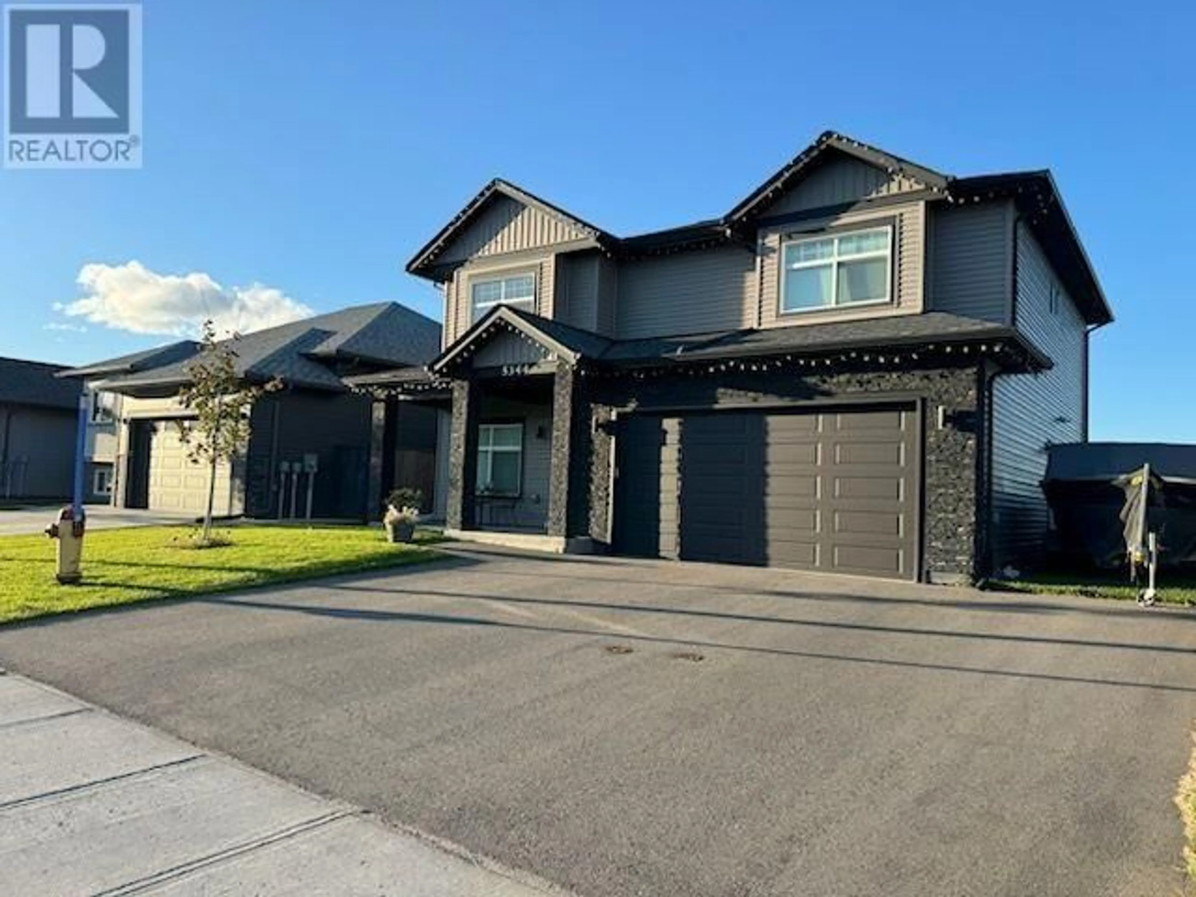 Home with vinyl exterior material, street for 5344 WOODVALLEY DRIVE, Prince George British Columbia V2K5A6