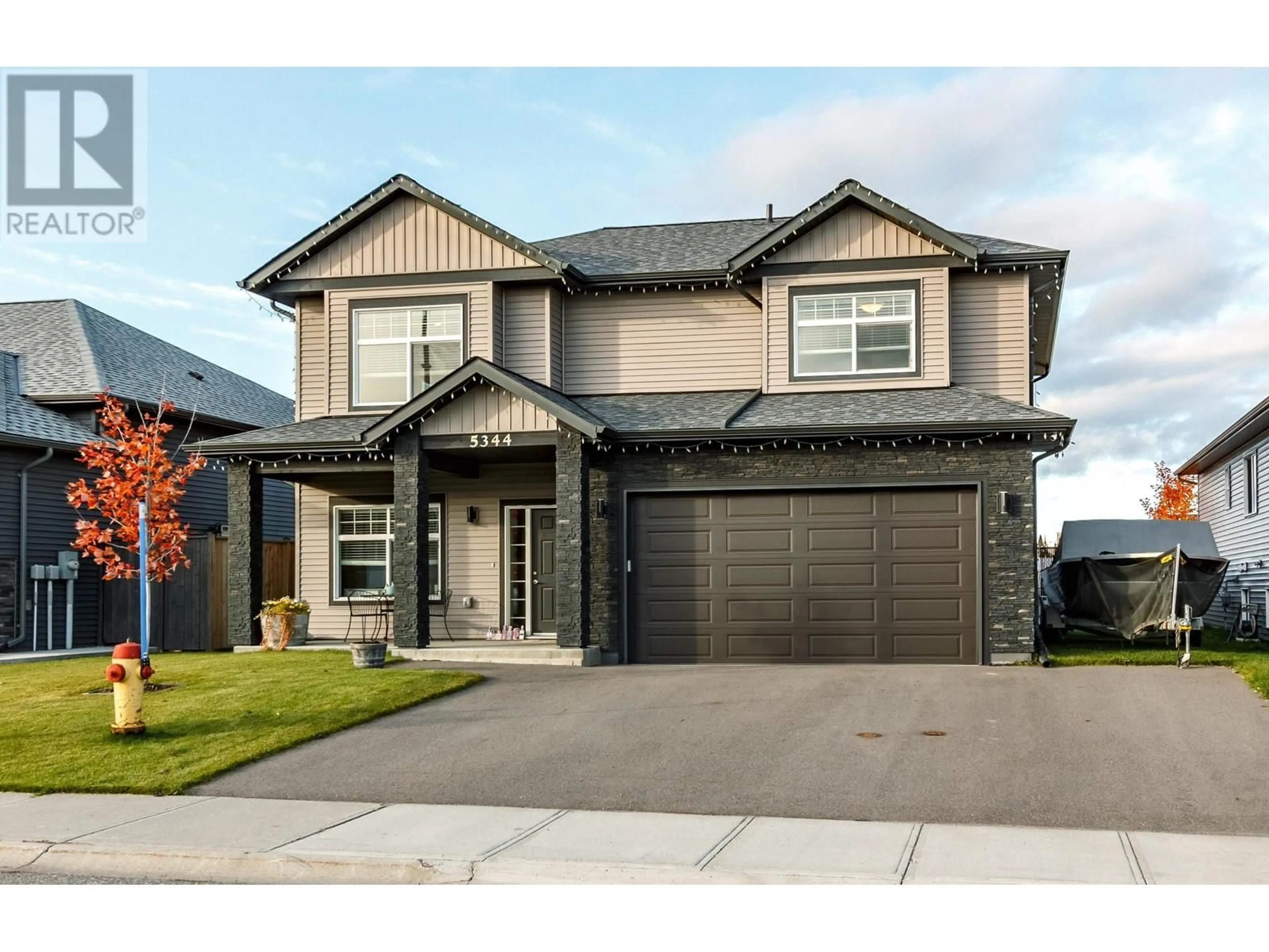 Home with brick exterior material, street for 5344 WOODVALLEY DRIVE, Prince George British Columbia V2K5A6
