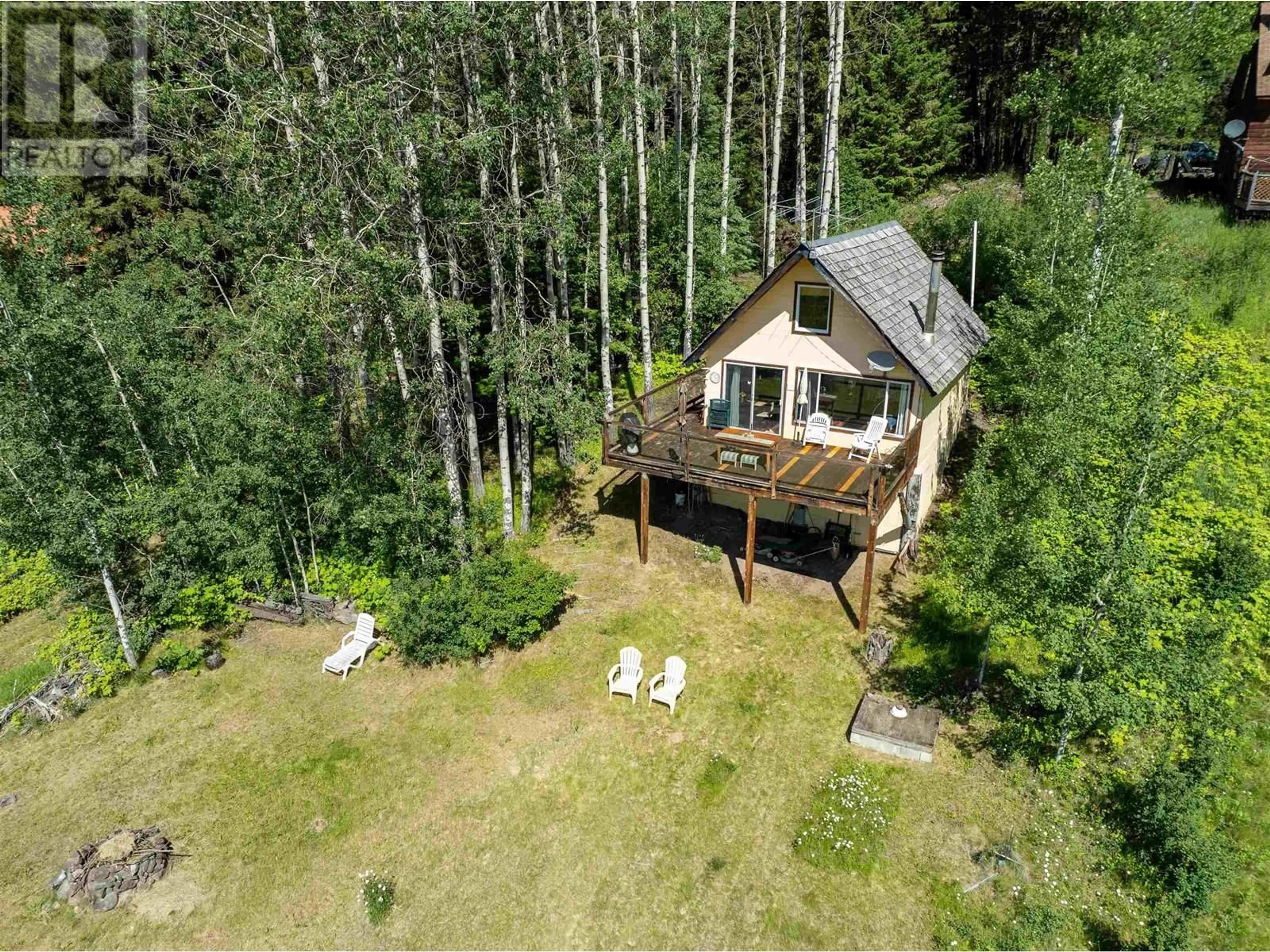 A pic from outside/outdoor area/front of a property/back of a property/a pic from drone, forest/trees view for 7101 NOVETA ROAD, Bridge Lake British Columbia V0K1X2