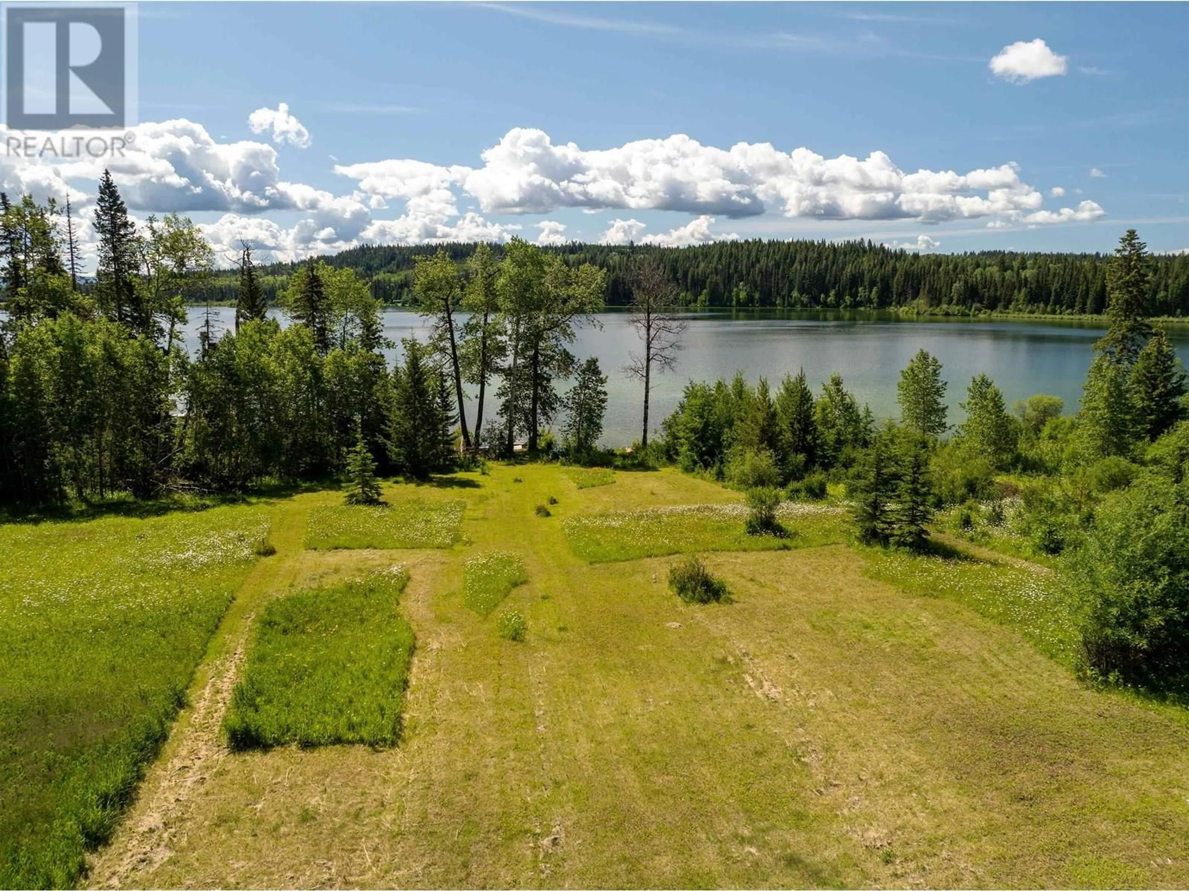 A pic from outside/outdoor area/front of a property/back of a property/a pic from drone, water/lake/river/ocean view for 7101 NOVETA ROAD, Bridge Lake British Columbia V0K1X2