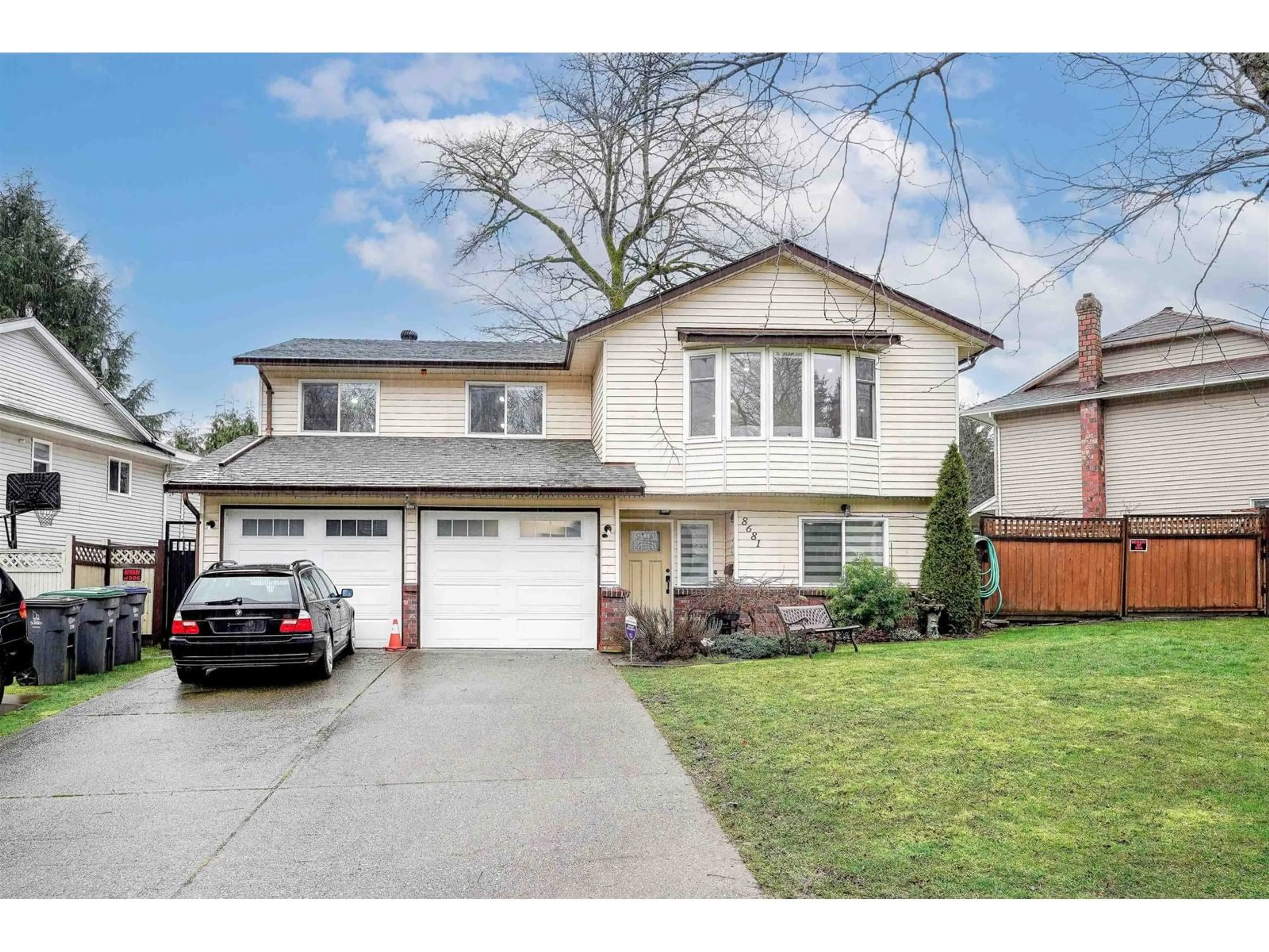 Home with vinyl exterior material, street for 8681 146A, Surrey British Columbia V3S6N7