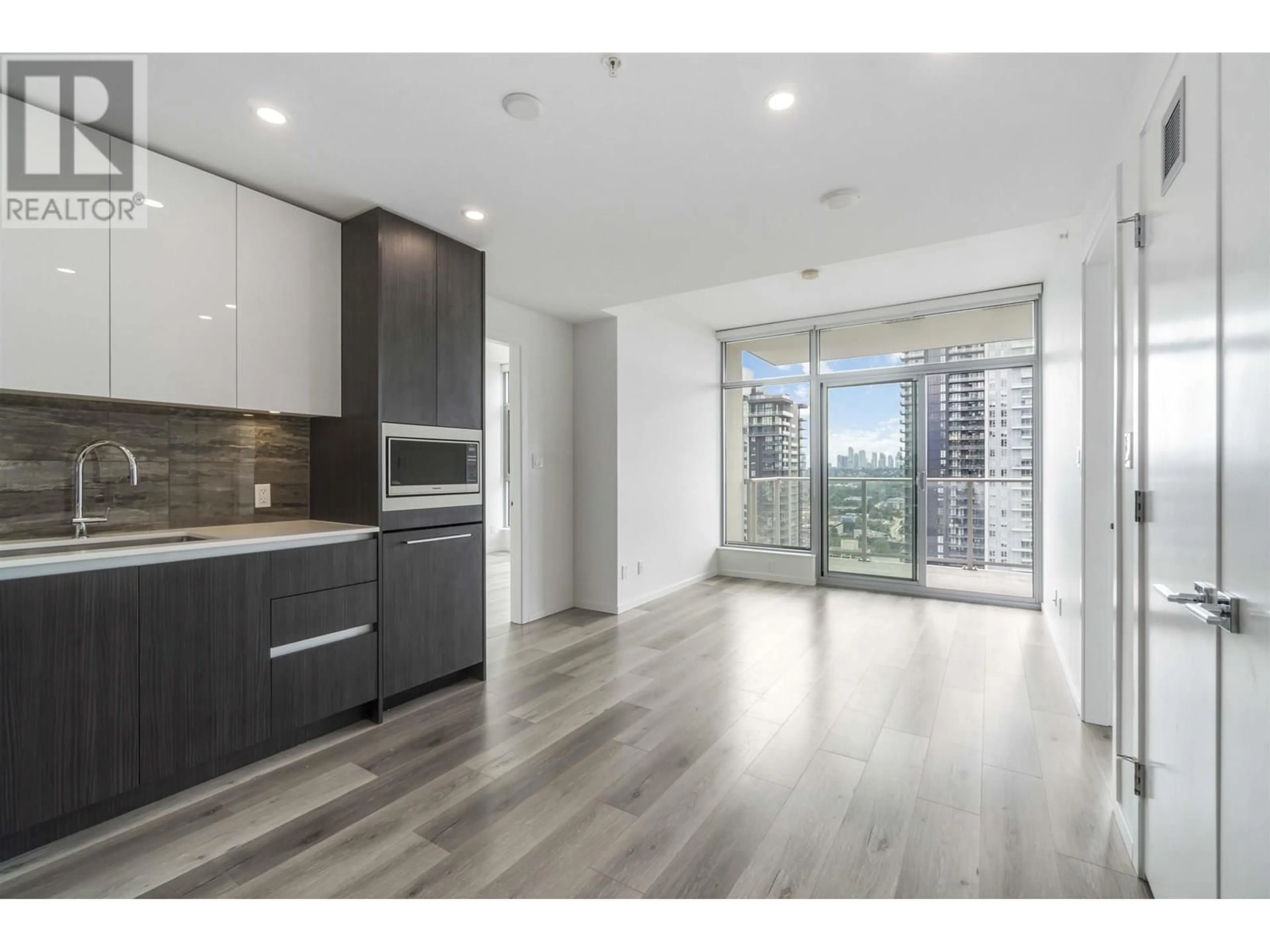 Open concept kitchen, wood/laminate floor for 3505 - 1888 GILMORE AVENUE, Burnaby British Columbia V5C0L2