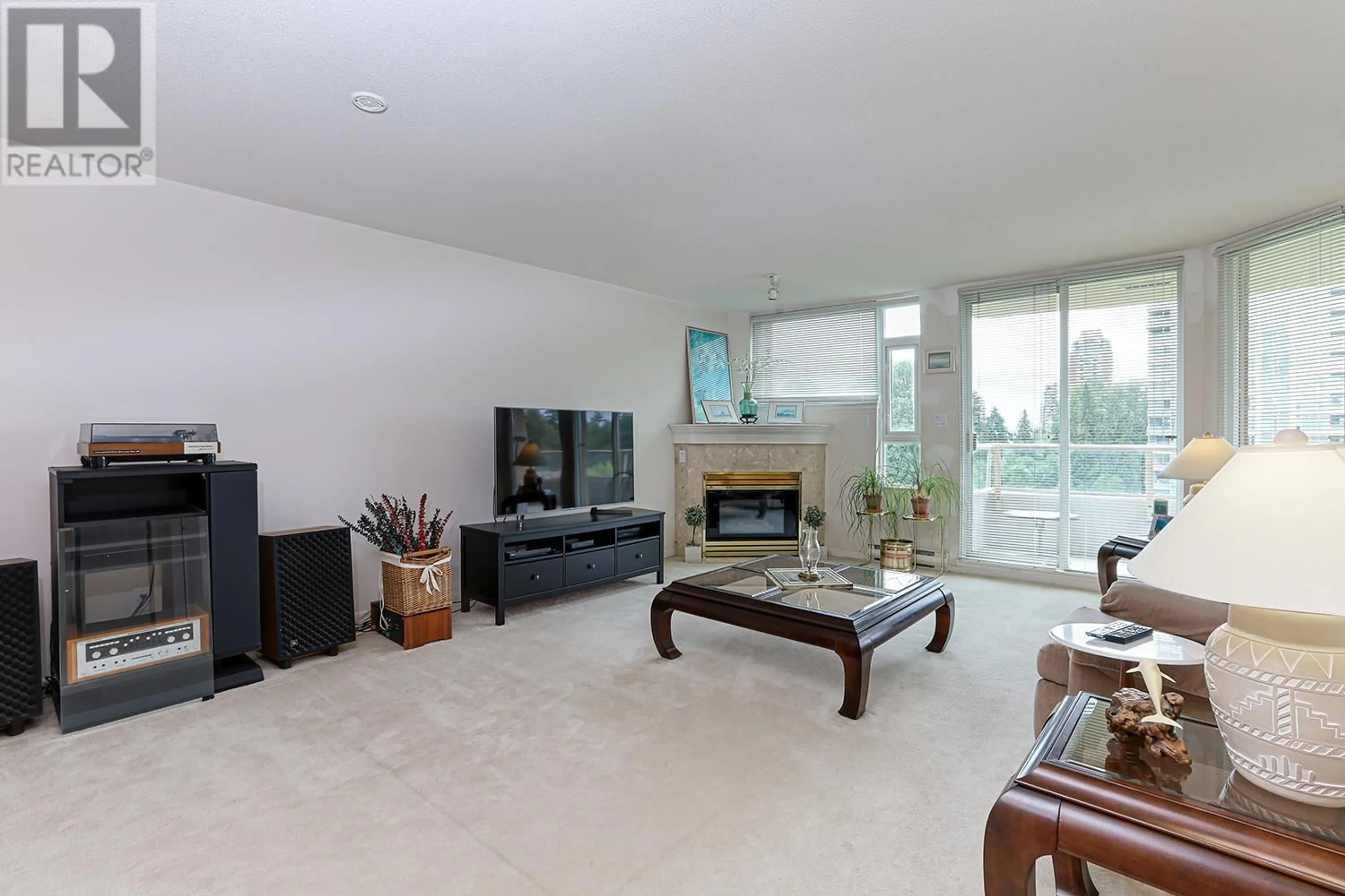 Living room with furniture, unknown for 702 - 7108 EDMONDS STREET, Burnaby British Columbia V3N4X9