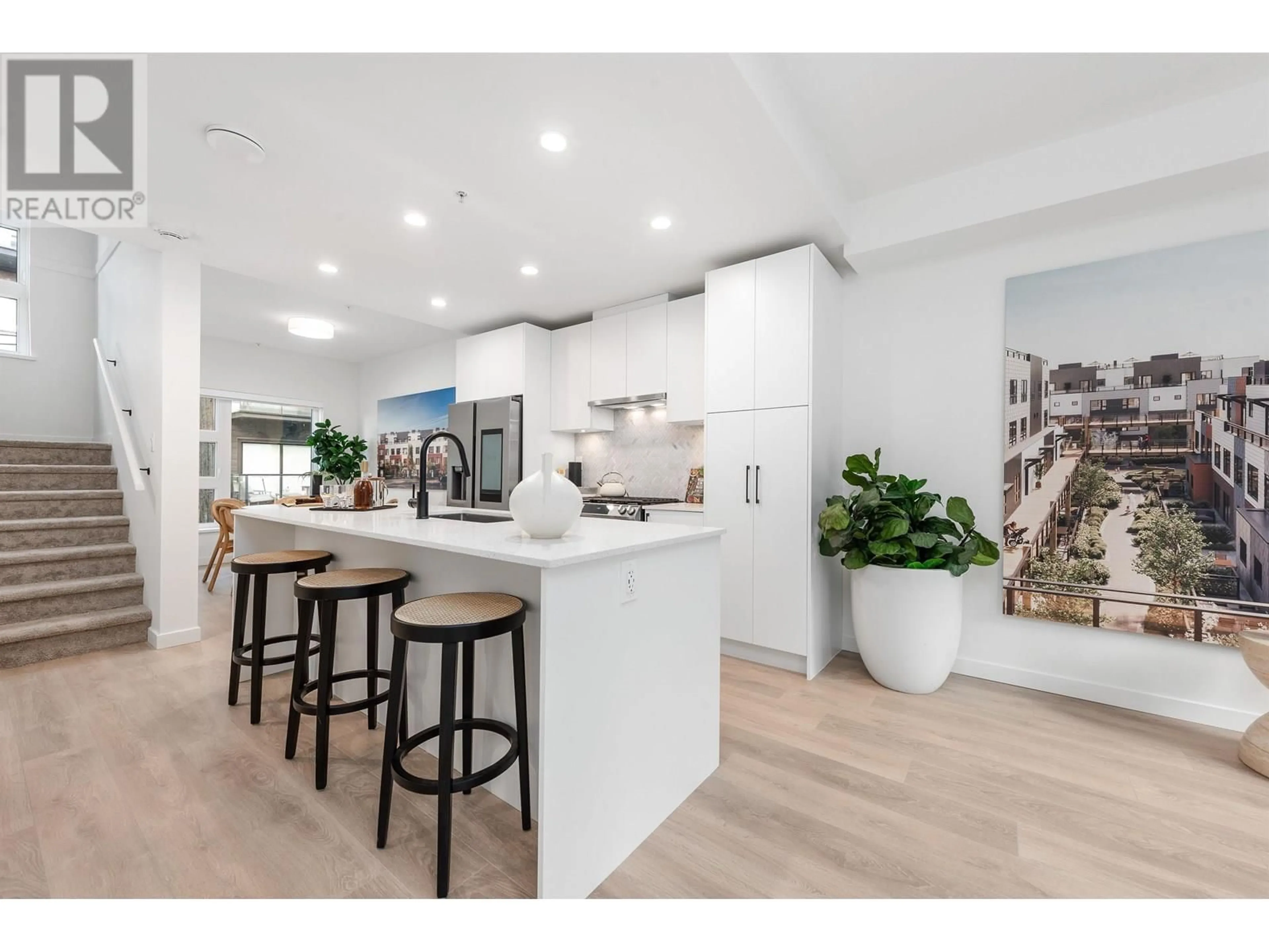 Open concept kitchen, wood/laminate floor for 135 - 535 2ND STREET, North Vancouver British Columbia V7L1E1