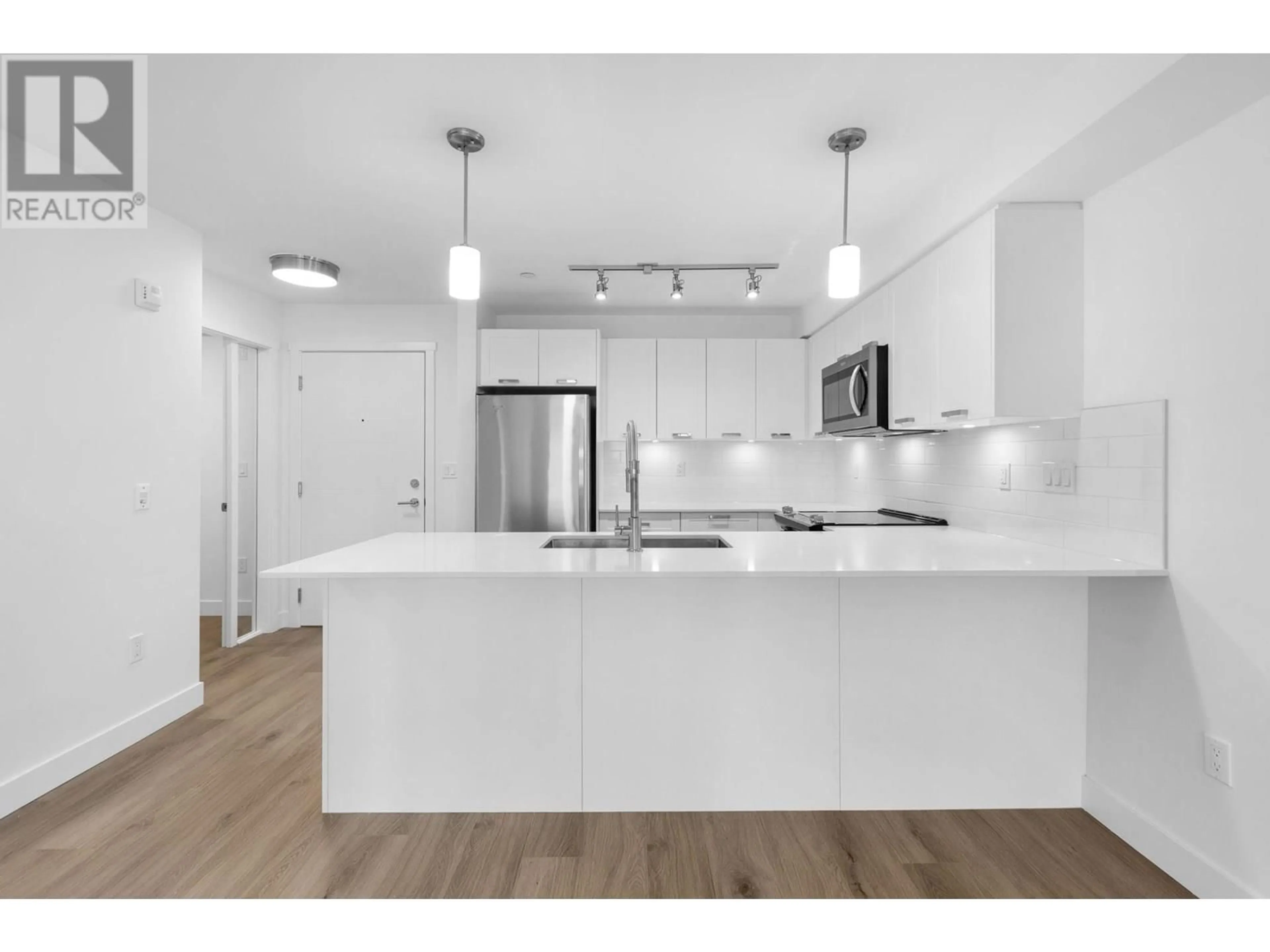Open concept kitchen, unknown for 306 - 22562 121 AVENUE, Maple Ridge British Columbia V2X3Y8