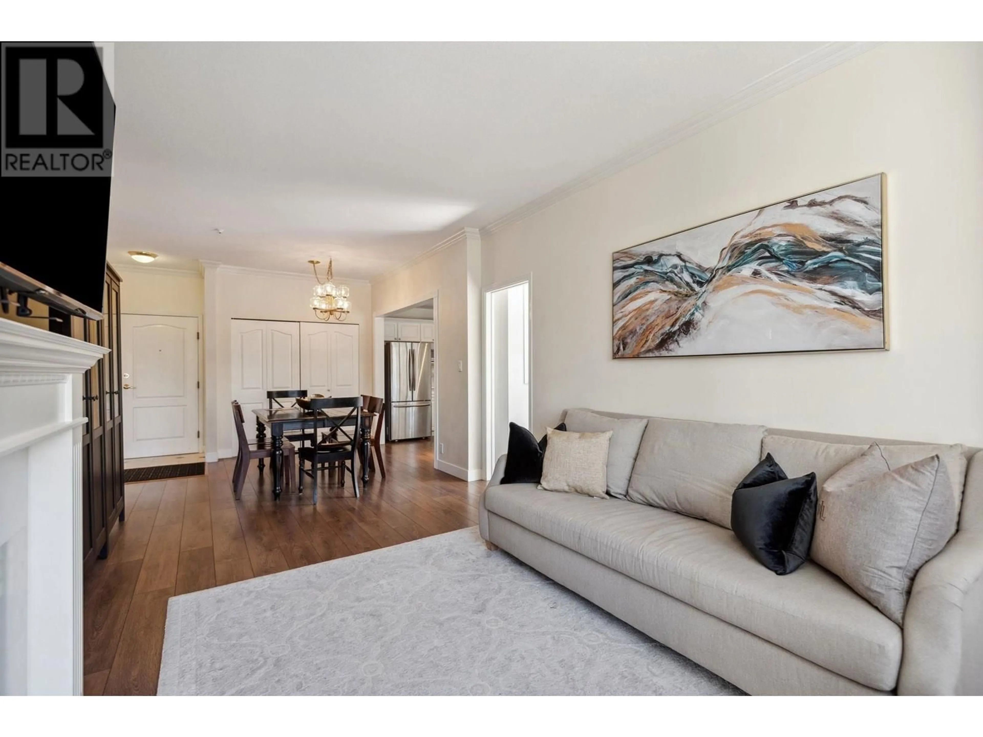 Living room with furniture, wood/laminate floor for 216 - 5735 HAMPTON PLACE, Vancouver British Columbia V6T2G8