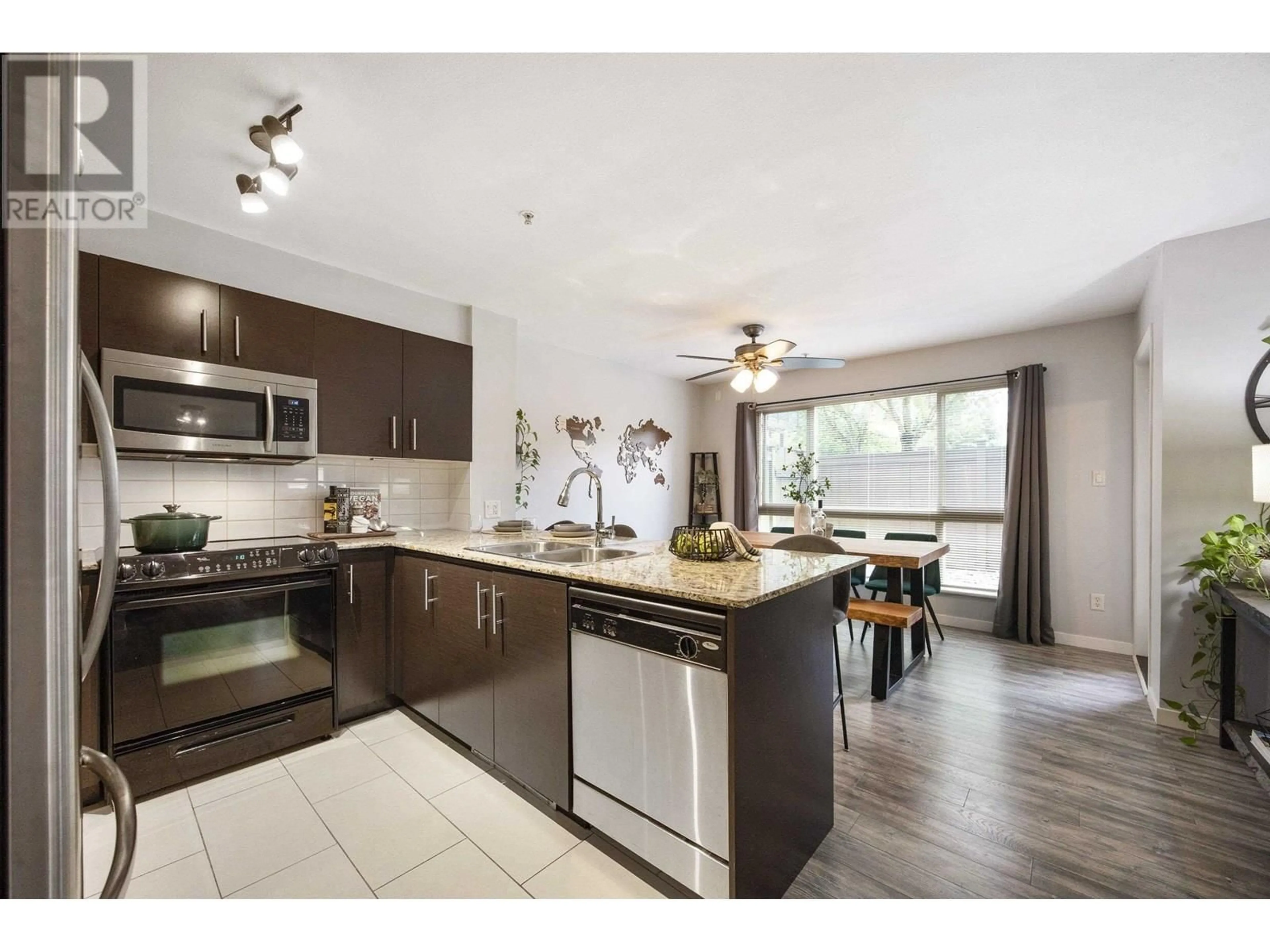 Open concept kitchen, wood/laminate floor for 102 - 11667 HANEY, Maple Ridge British Columbia V2X8W9