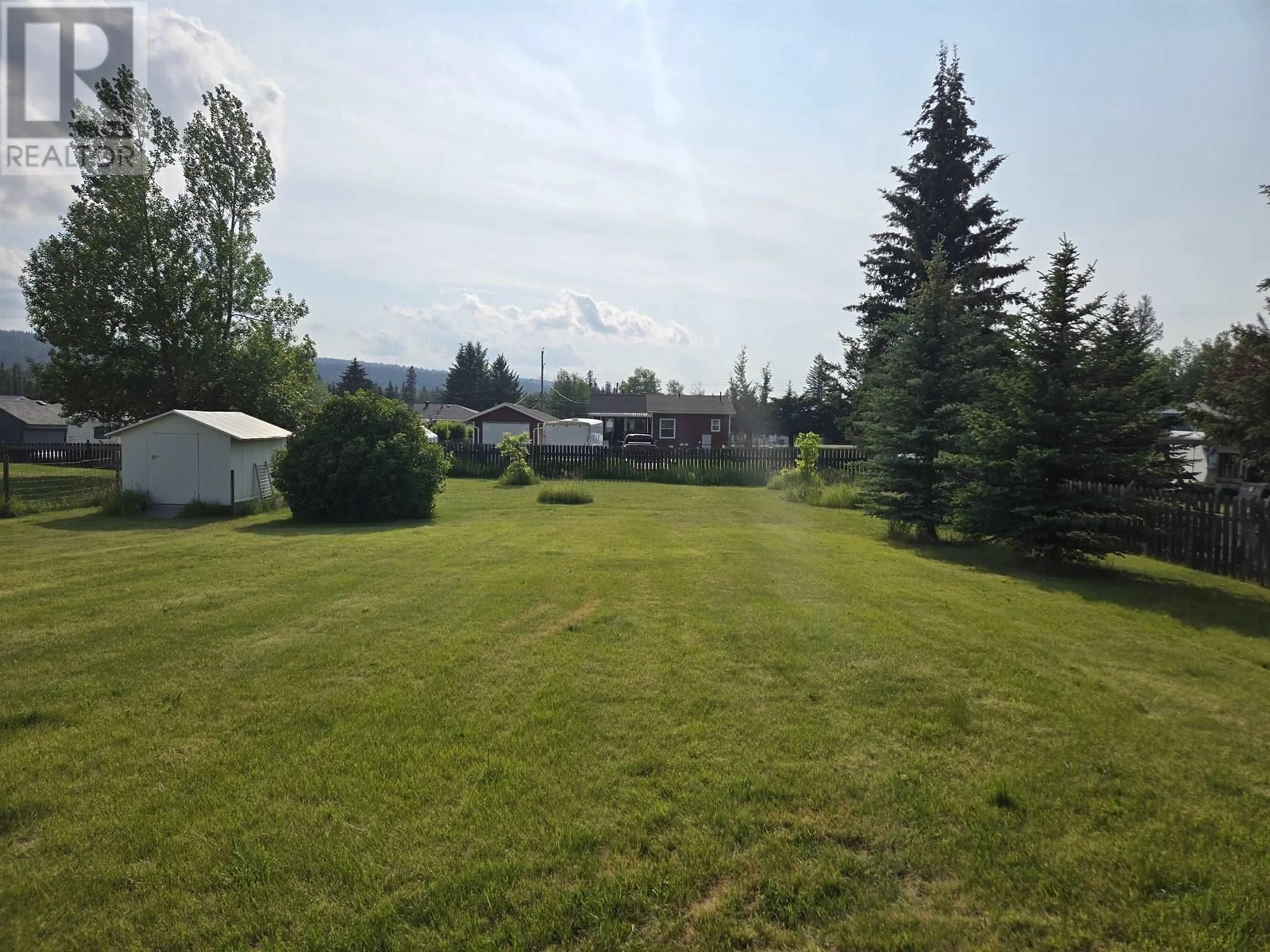 A pic from outside/outdoor area/front of a property/back of a property/a pic from drone, mountain view for 223 BLACKSTOCK ROAD, 100 Mile House British Columbia V0K2E3