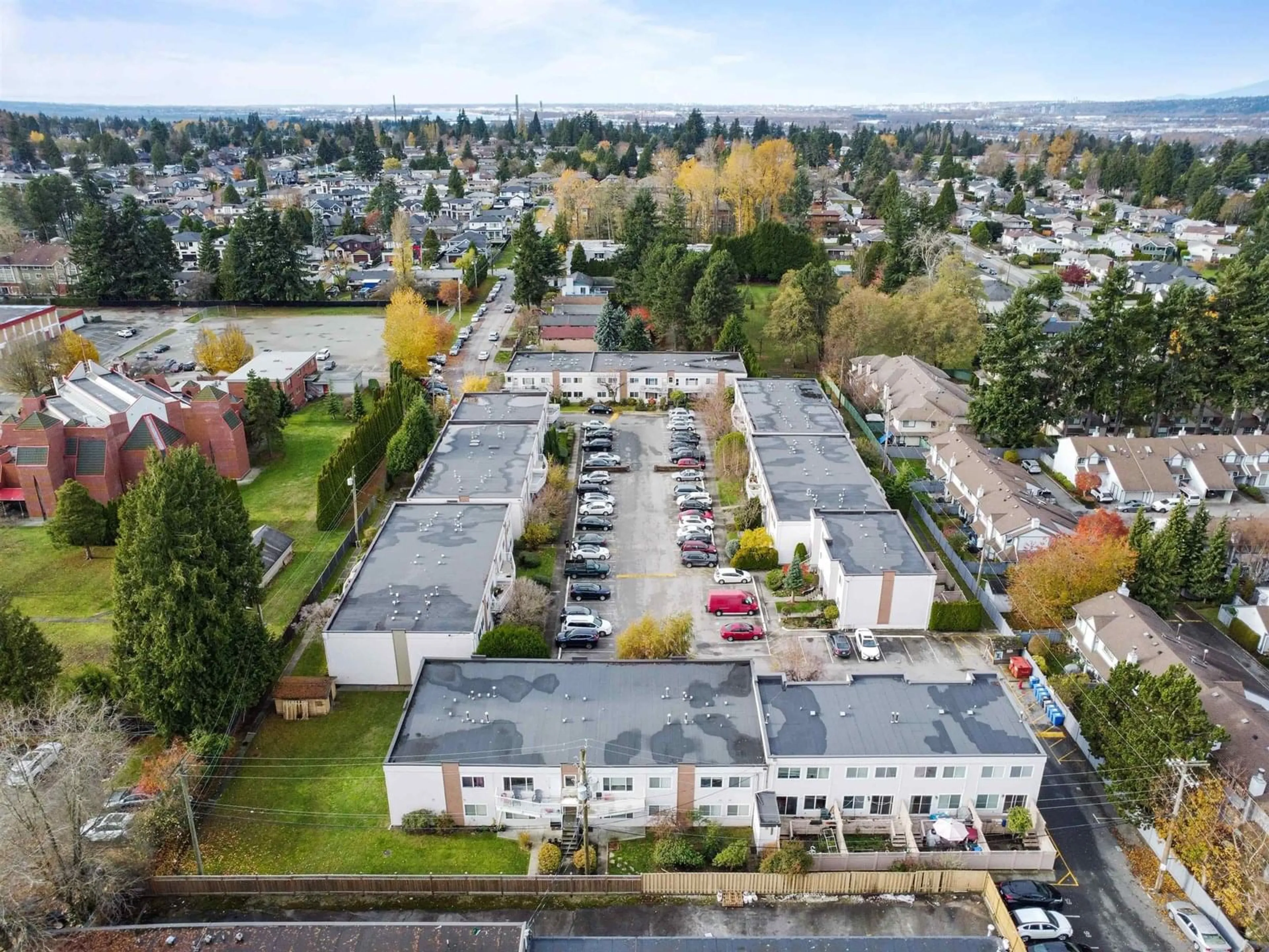 A pic from outside/outdoor area/front of a property/back of a property/a pic from drone, unknown for 106 - 11901 89A, Surrey British Columbia V4C3G8