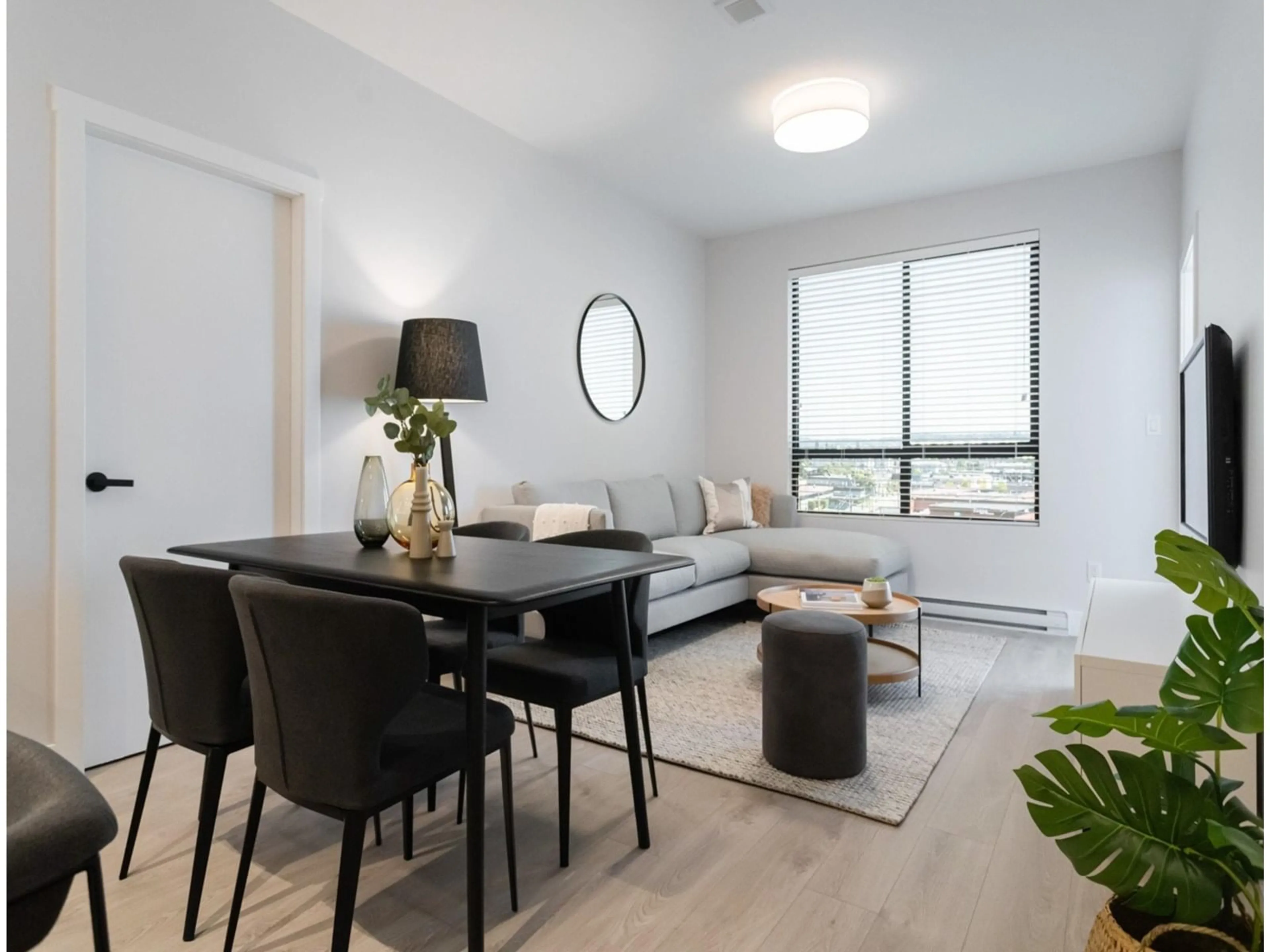 Living room with furniture, wood/laminate floor for 104 - 13458 95, Surrey British Columbia V3V1P5