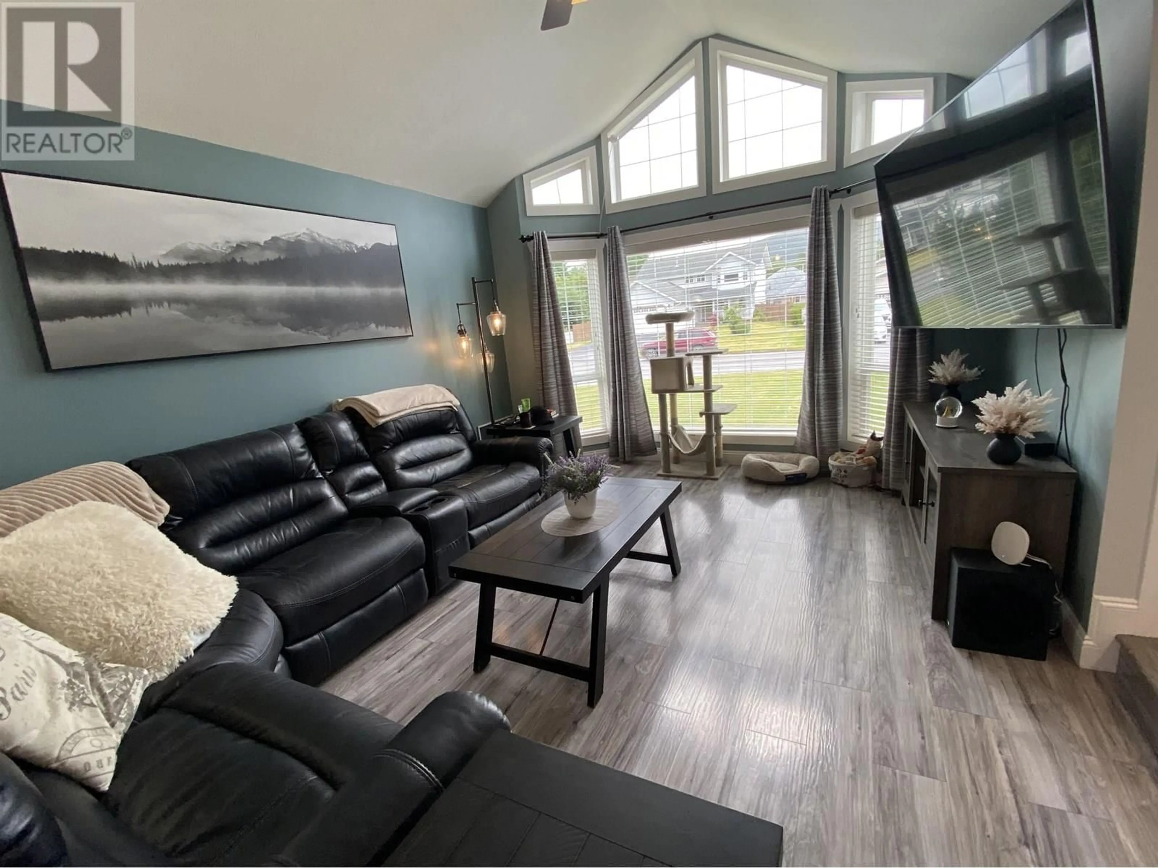 Living room with furniture, wood/laminate floor for 4932 HUNDAL DRIVE, Terrace British Columbia V8G5N8