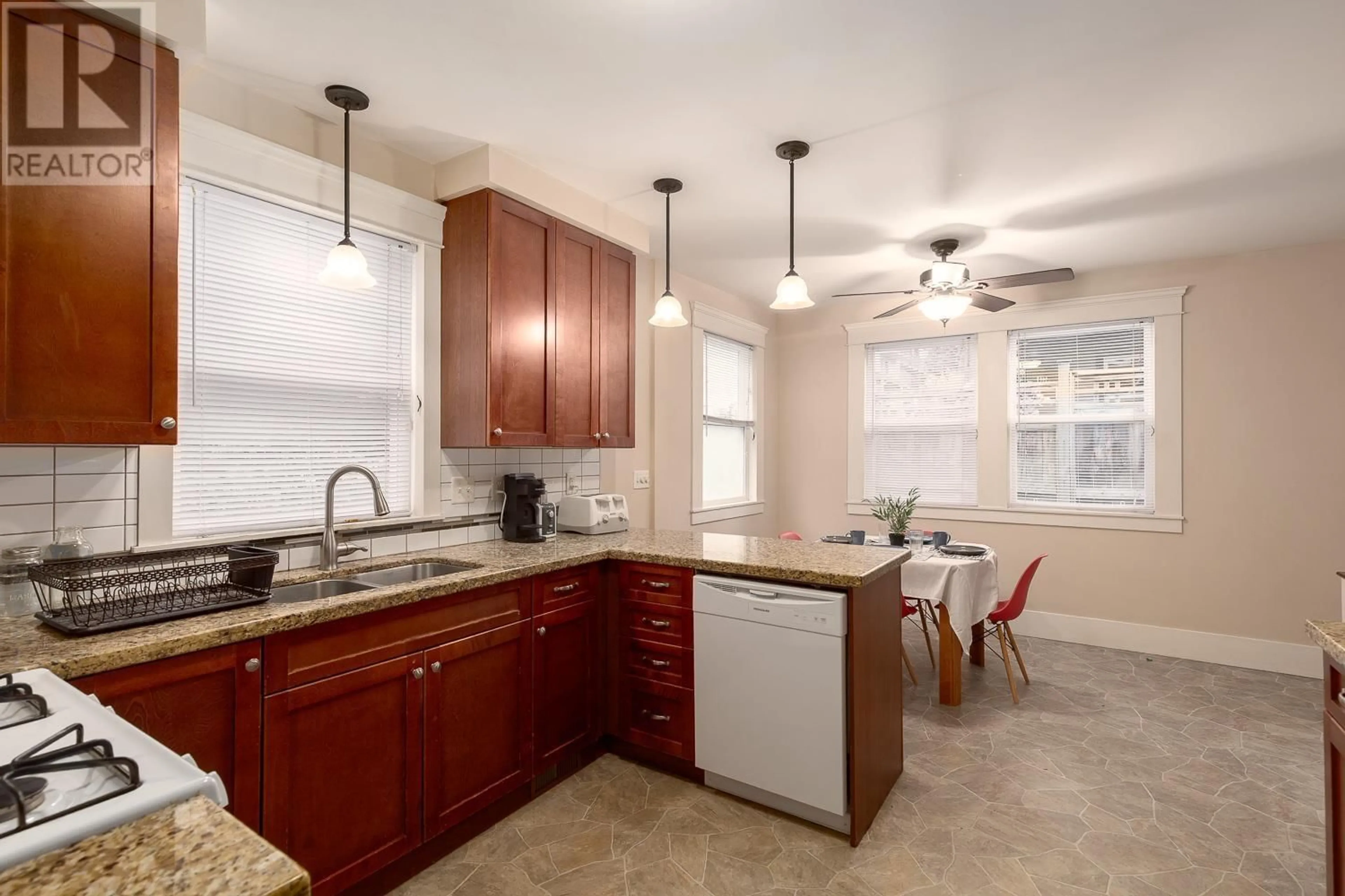 Open concept kitchen, ceramic/tile floor for 832 SALSBURY DRIVE, Vancouver British Columbia V5L4A2