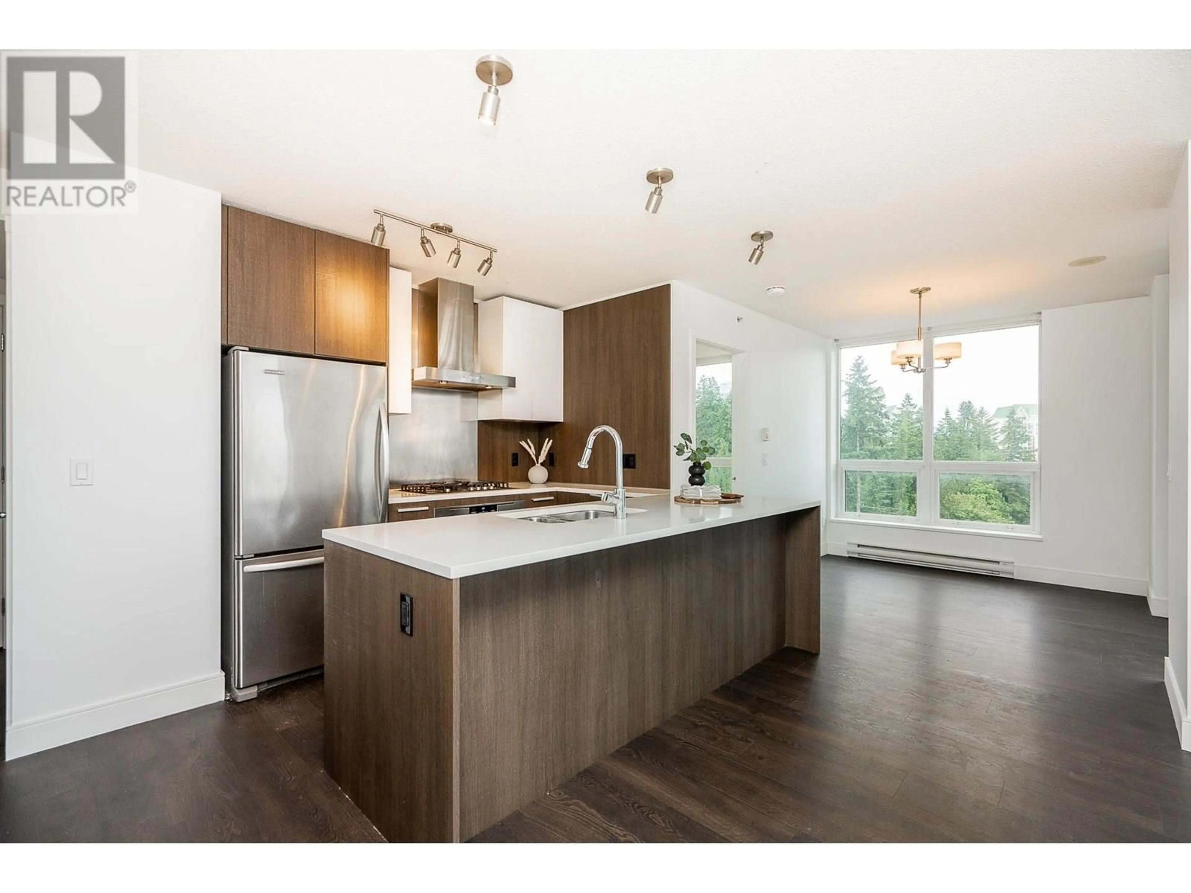 Open concept kitchen, wood/laminate floor for 1105 - 3007 GLEN DRIVE, Coquitlam British Columbia V3B0L8