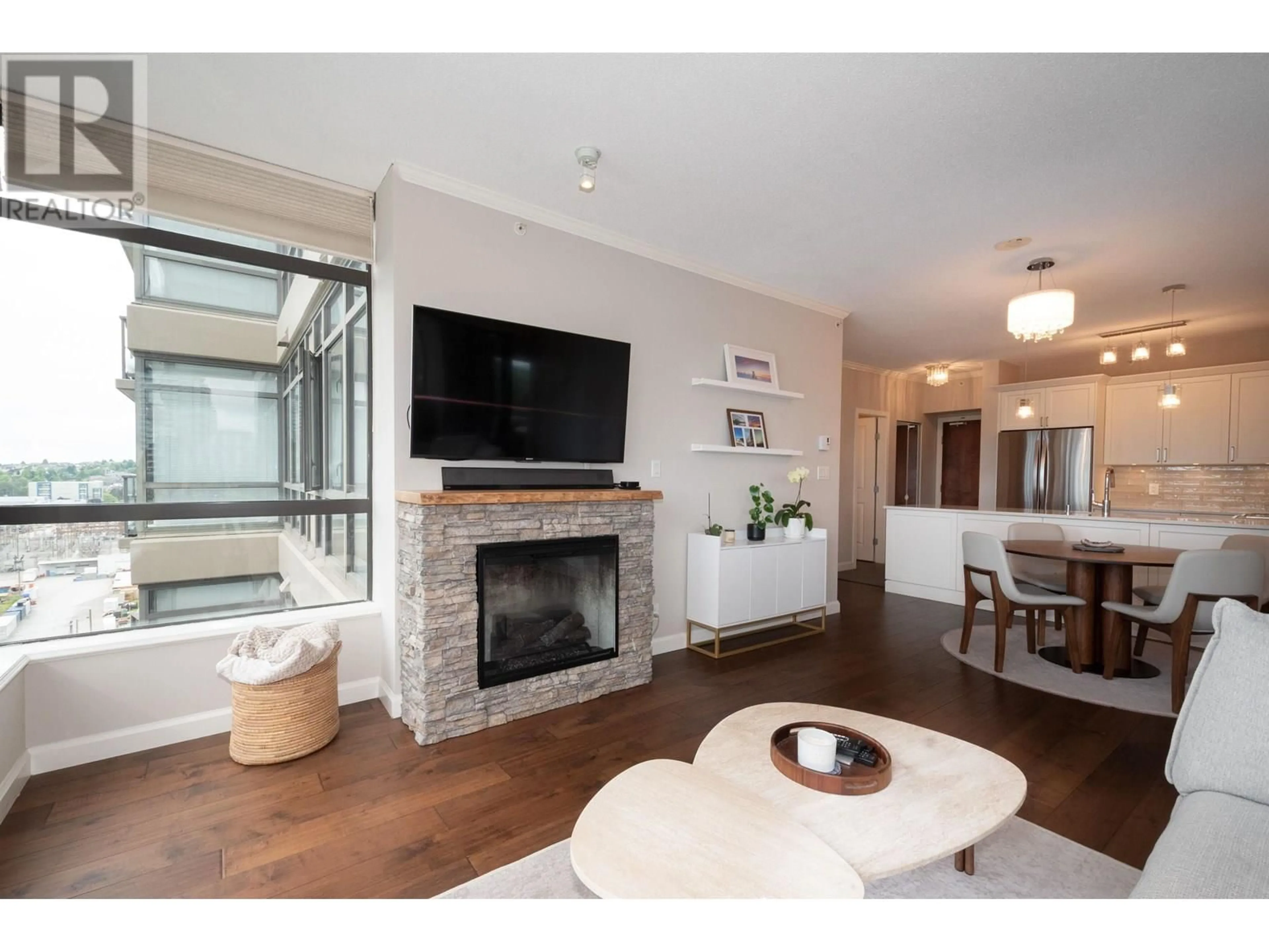 Living room with furniture, wood/laminate floor for 1006 - 4132 HALIFAX STREET, Burnaby British Columbia V5C6V1