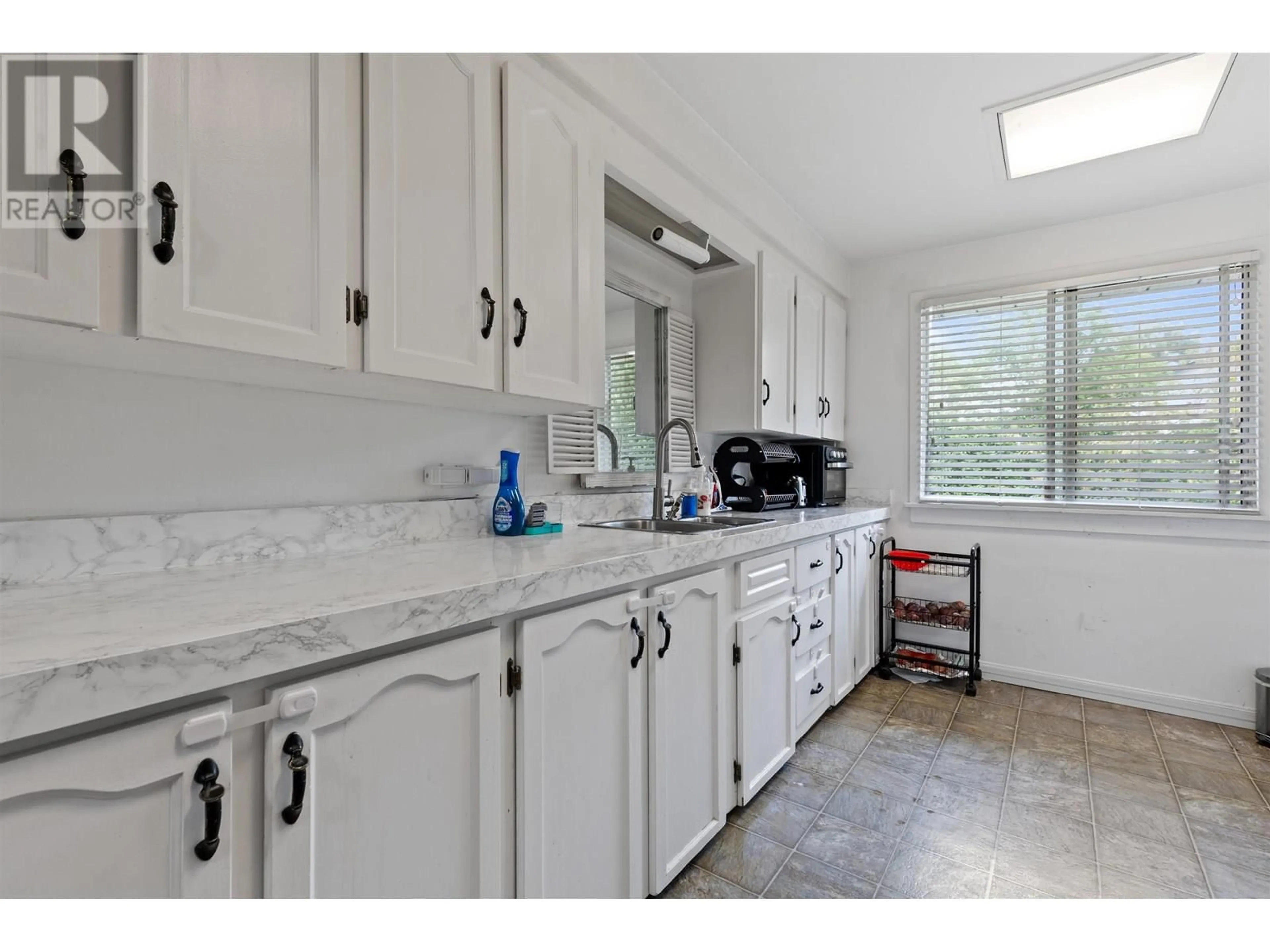 Standard kitchen, ceramic/tile floor for 12121 228 STREET, Maple Ridge British Columbia V2X6M2