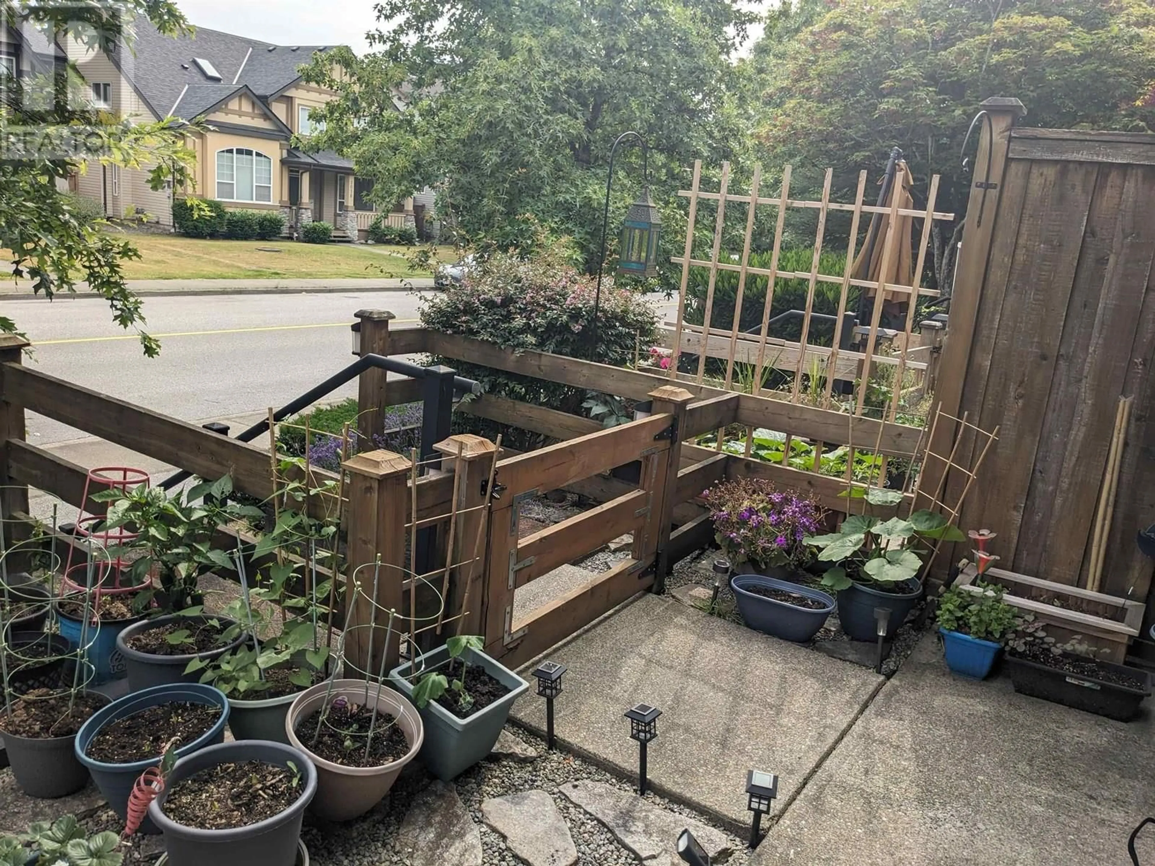 A pic from outside/outdoor area/front of a property/back of a property/a pic from drone, unknown for 64 - 1055 RIVERWOOD GATE, Port Coquitlam British Columbia V3B8C3