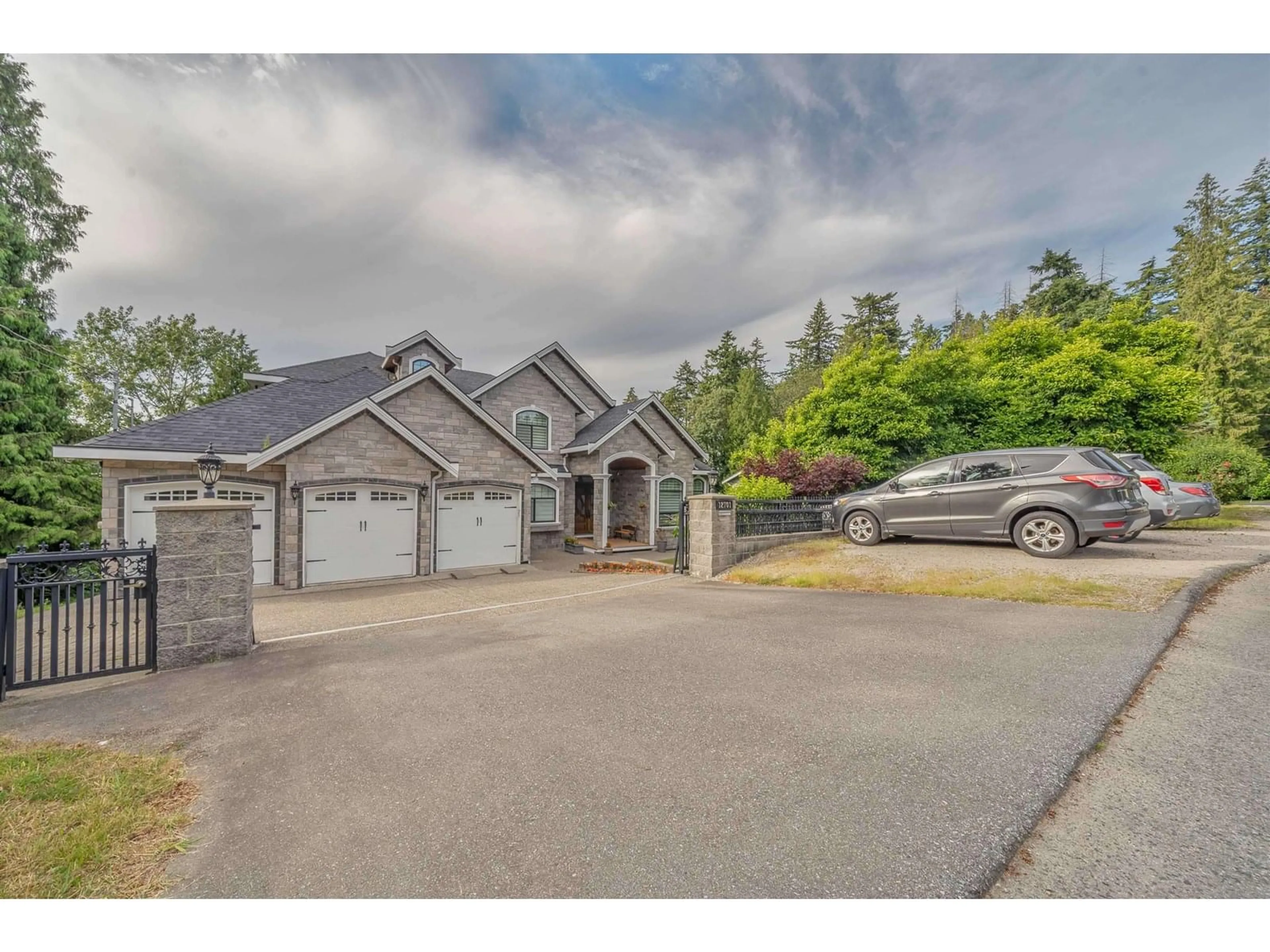 A pic from outside/outdoor area/front of a property/back of a property/a pic from drone, street for 12701 107A, Surrey British Columbia V3V3J3