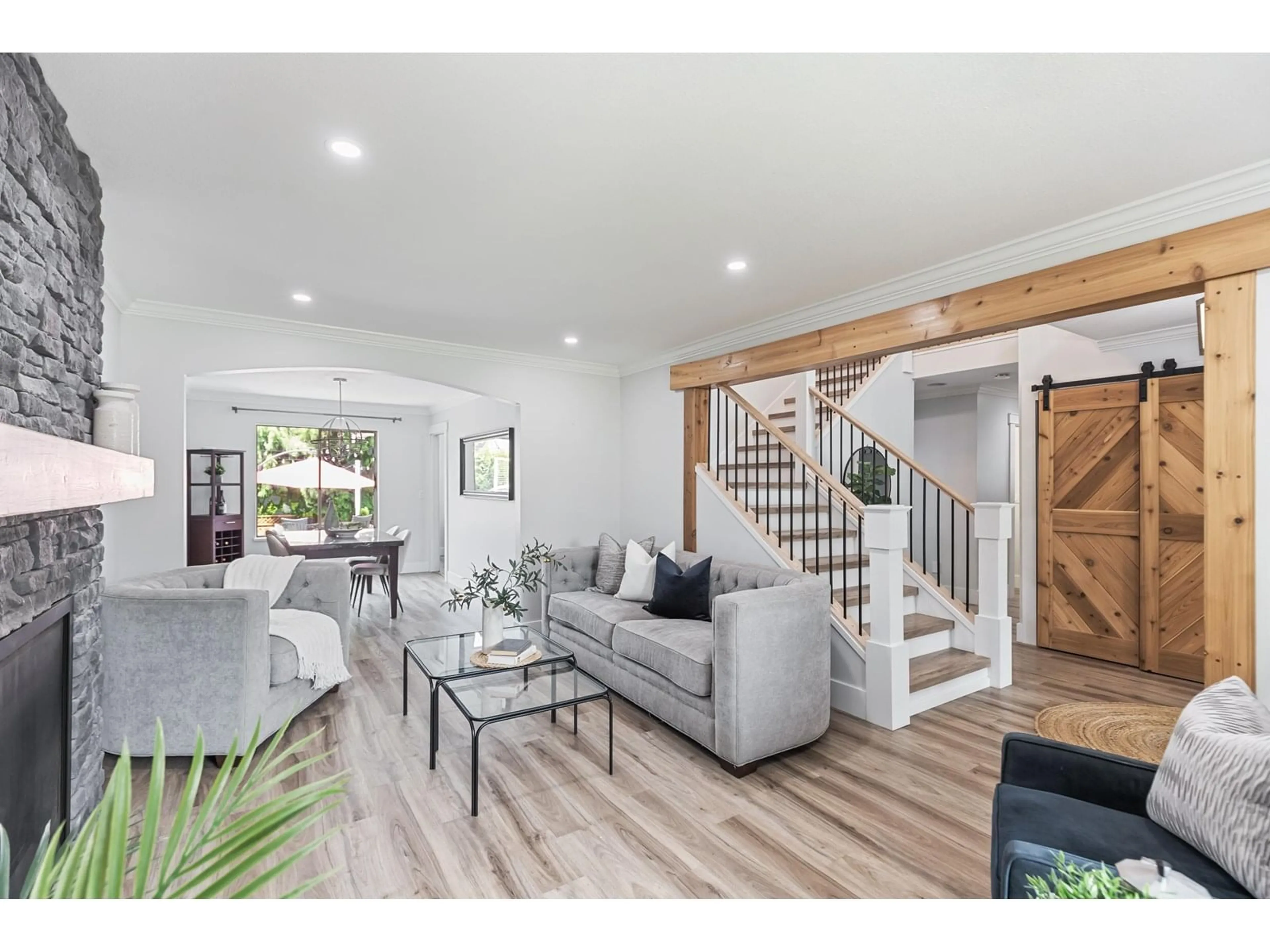 Living room with furniture, wood/laminate floor for 20365 91B, Langley British Columbia V1M2G1