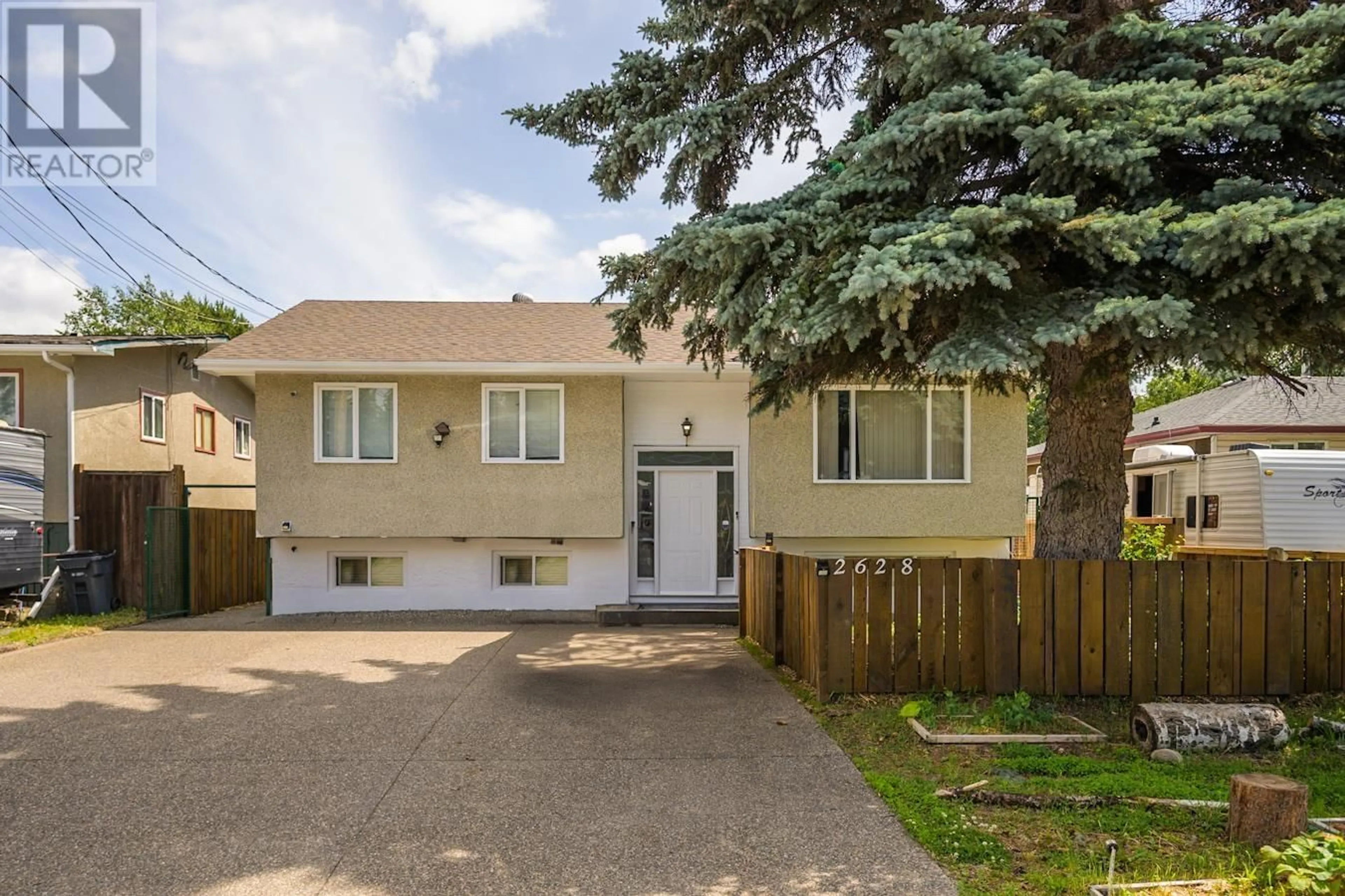 Home with vinyl exterior material, street for 2628 MOYIE STREET, Prince George British Columbia V2L1V6