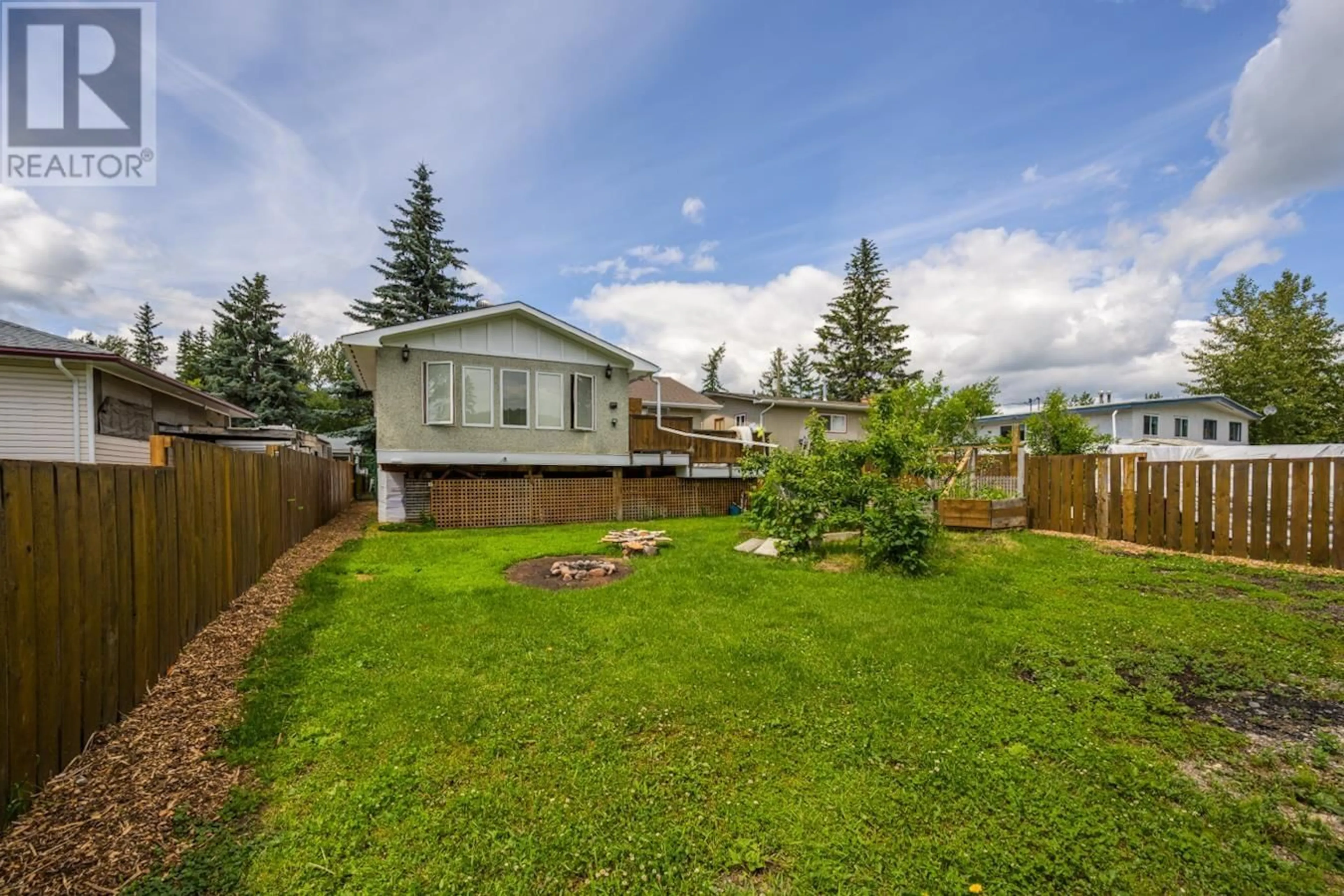 A pic from outside/outdoor area/front of a property/back of a property/a pic from drone, mountain view for 2628 MOYIE STREET, Prince George British Columbia V2L1V6
