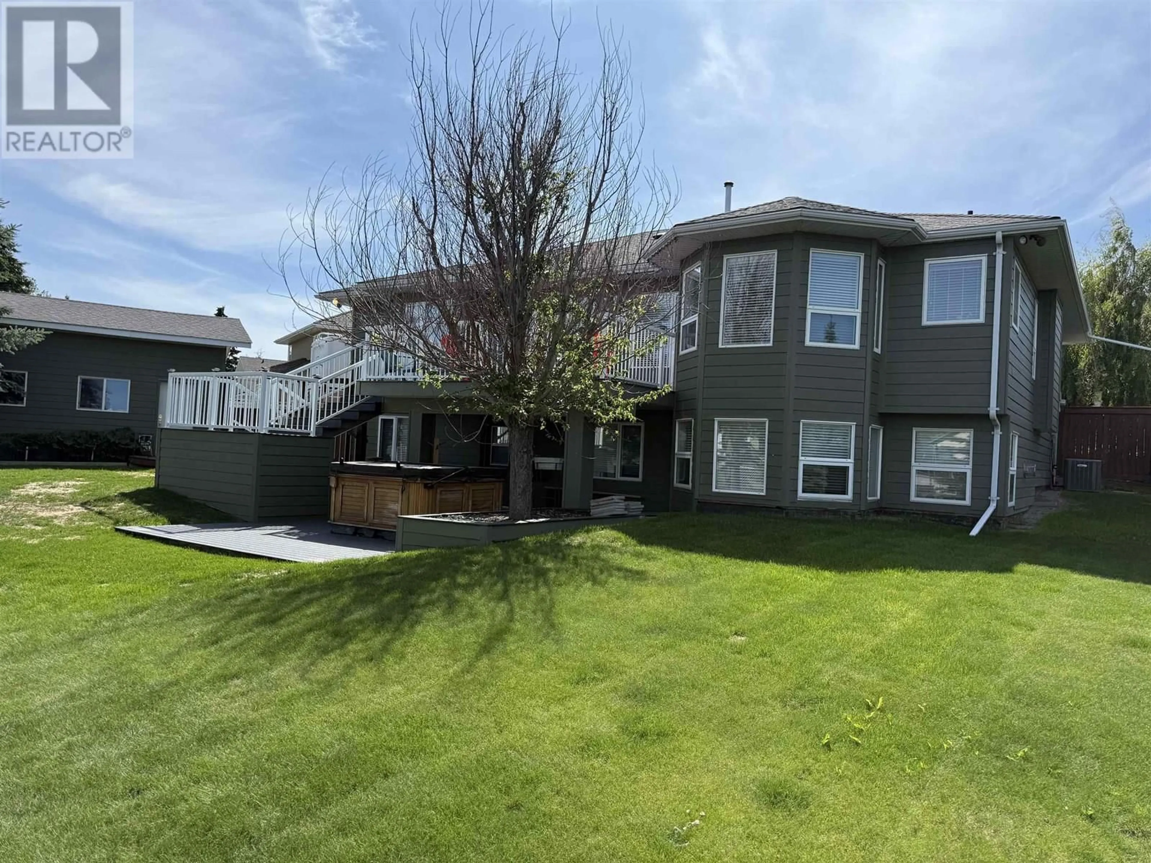 A pic from outside/outdoor area/front of a property/back of a property/a pic from drone, unknown for 10912 112 AVENUE, Fort St. John British Columbia V1J6H1