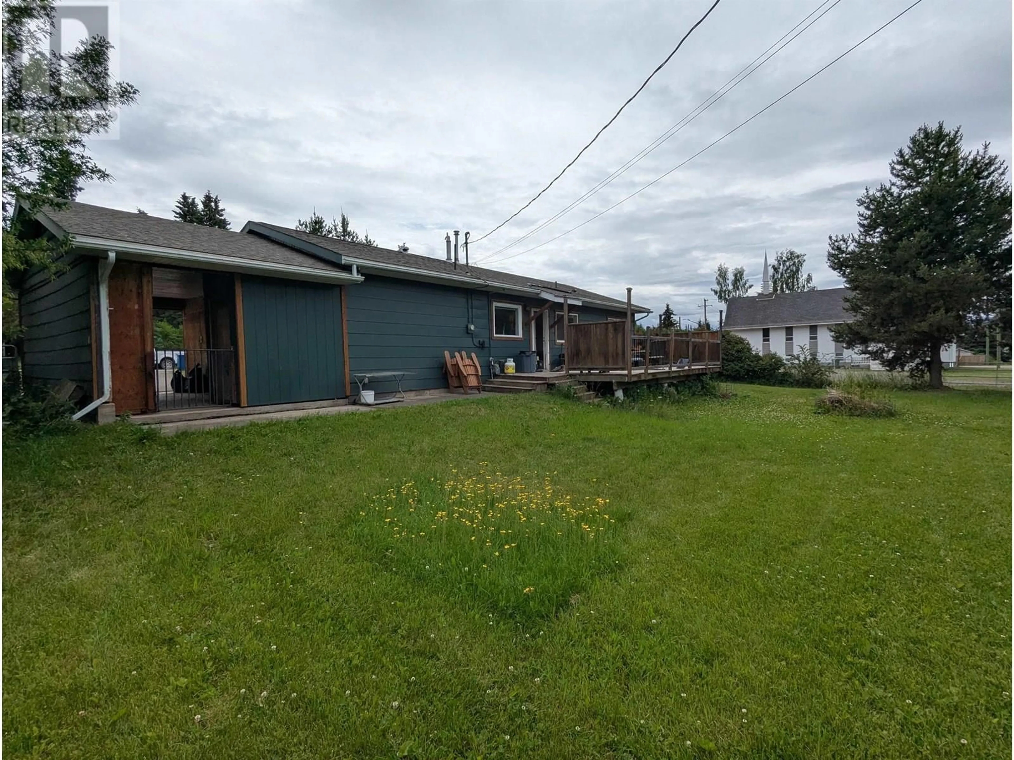 A pic from outside/outdoor area/front of a property/back of a property/a pic from drone, street for 3937 7TH AVENUE, Smithers British Columbia V0J2N0